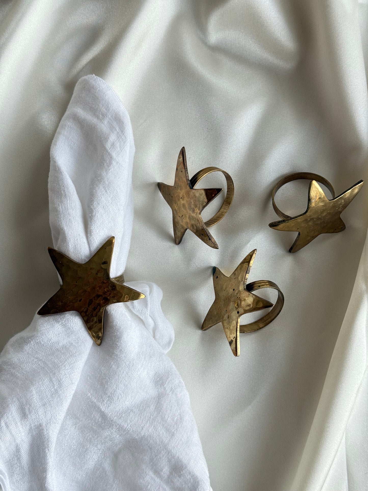 Brass star napkin rings