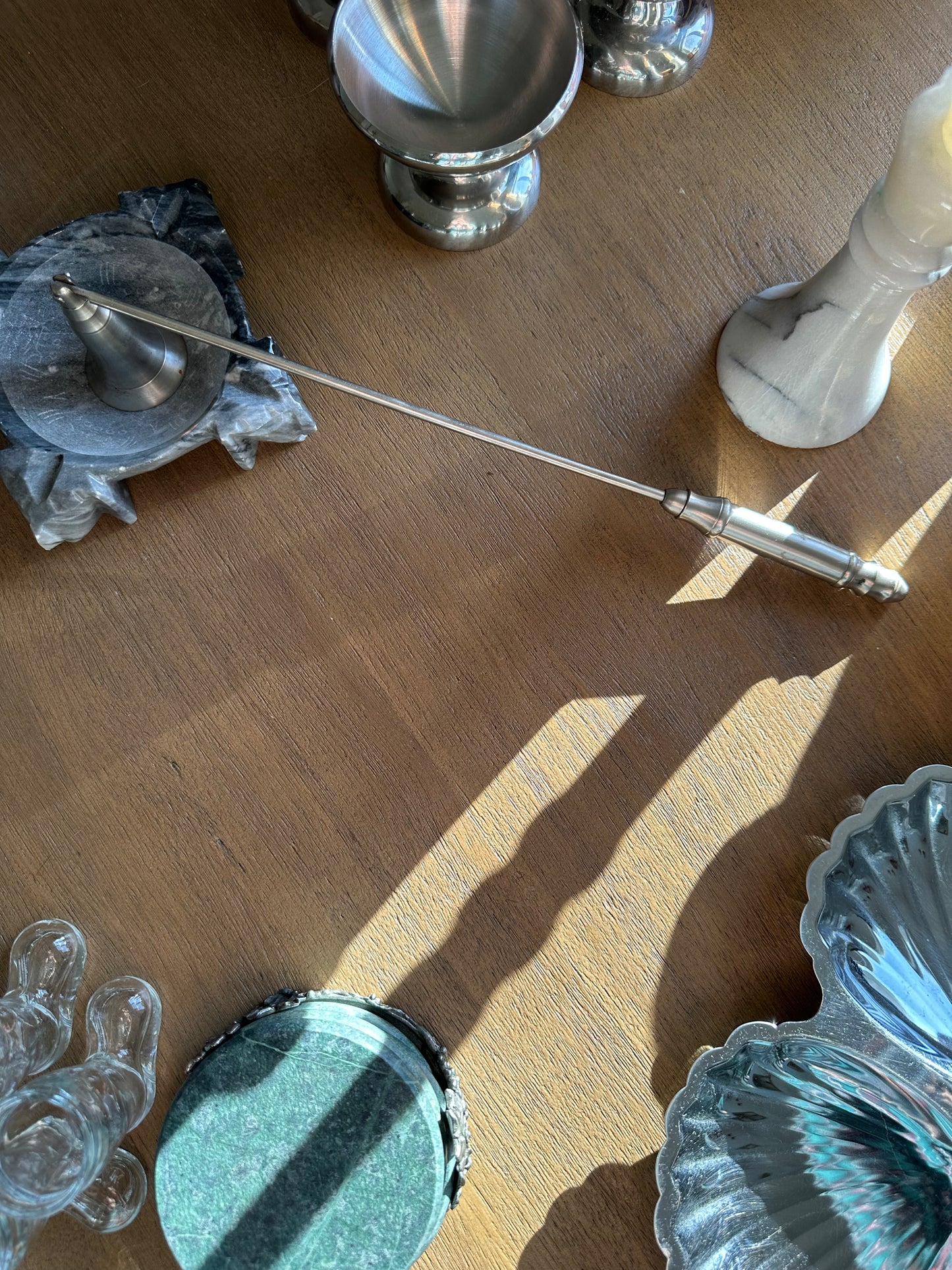 Large silver tone snuffer