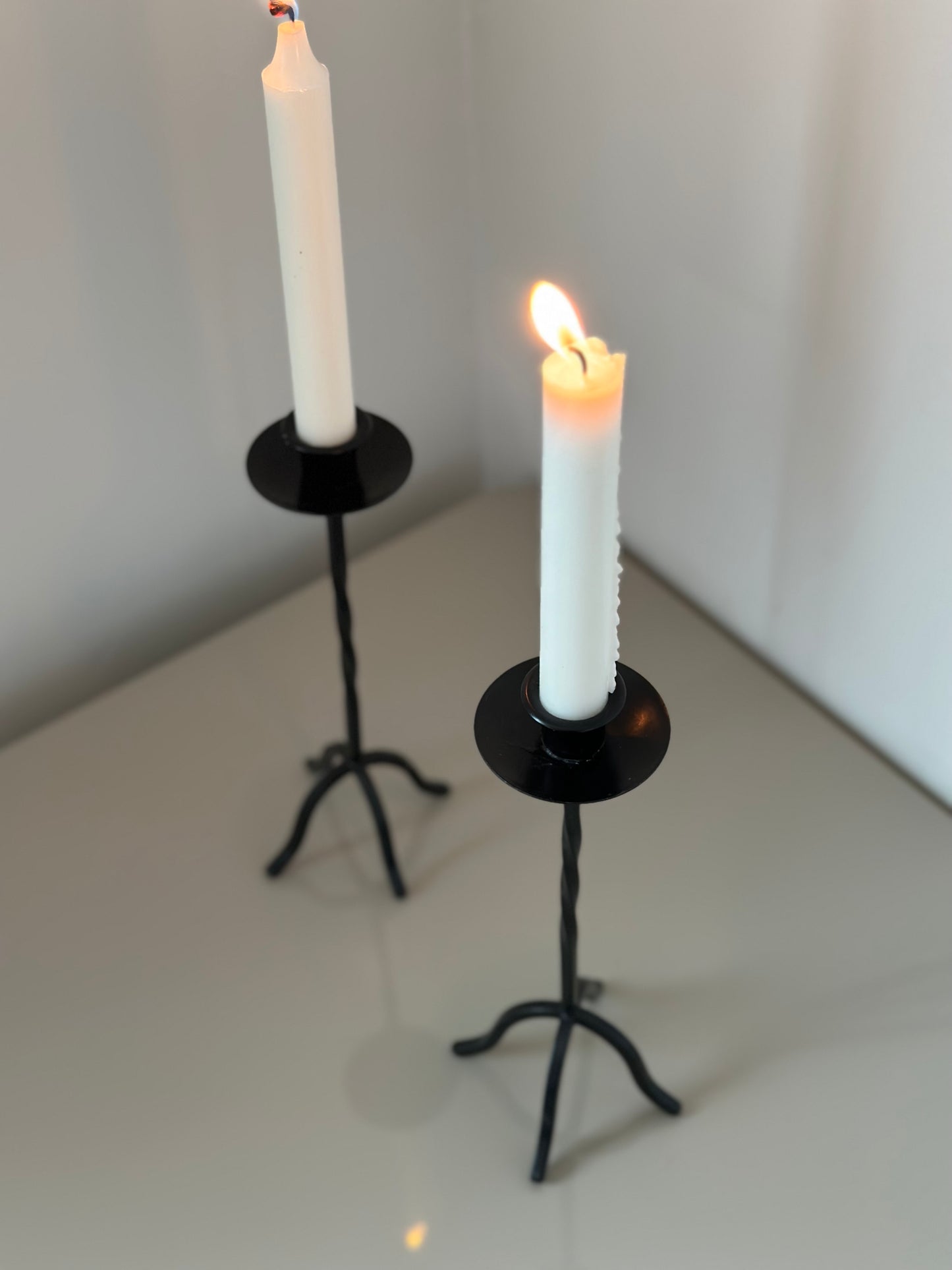 Black metal candleholders