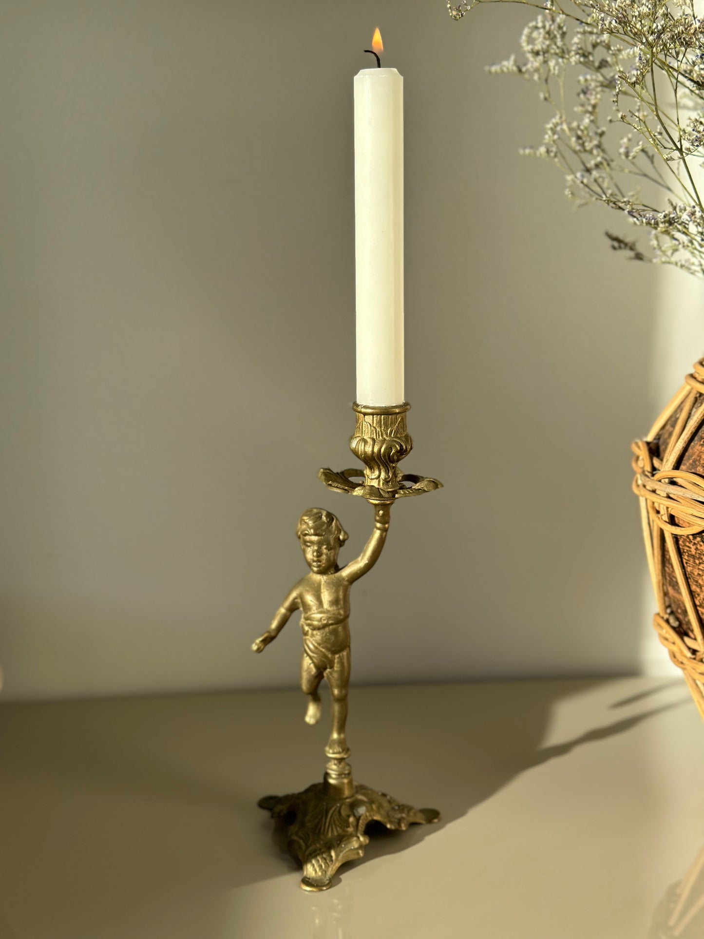 Brass cherub candleholder