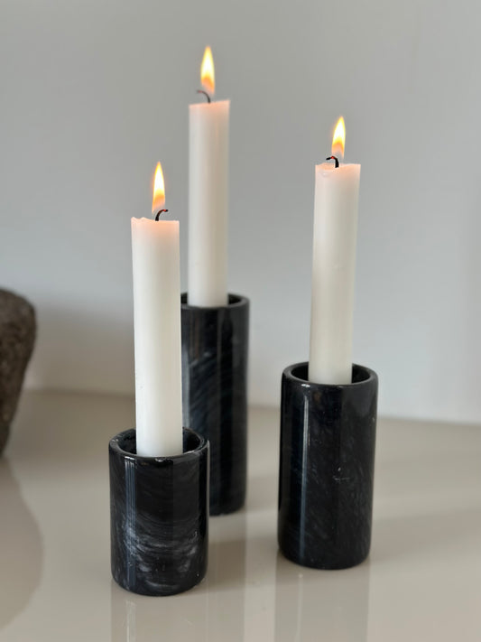 Three marble candleholders