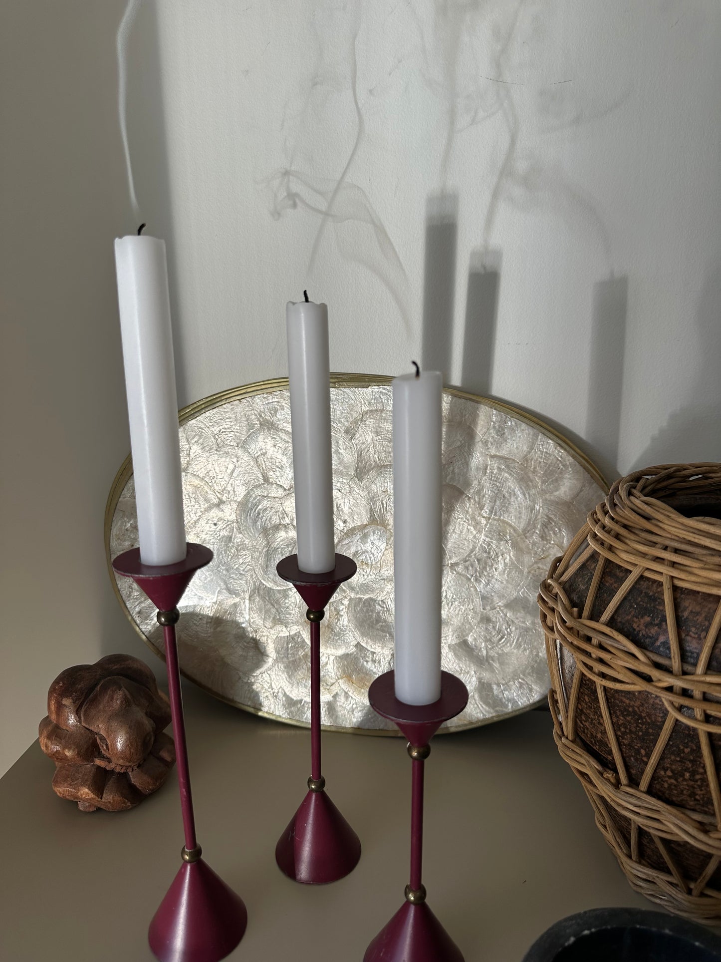 Three purple candleholders