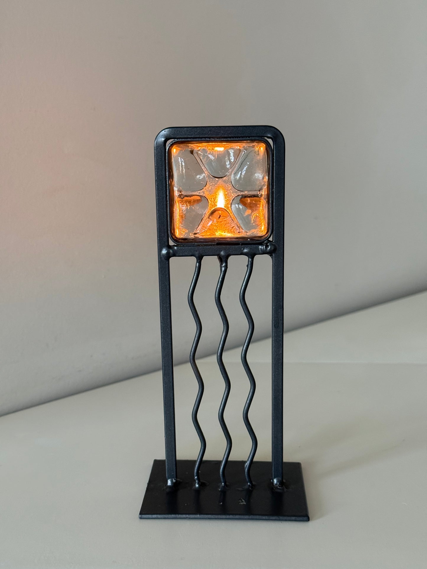 sculptural metal candle holder
