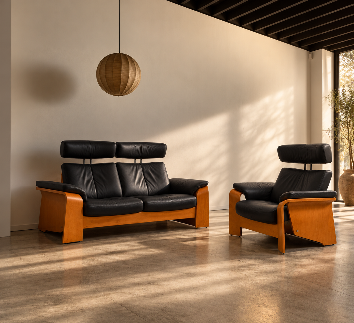Stressless Pegasus loveseat and armchair by Ekornes, crafted in Norway