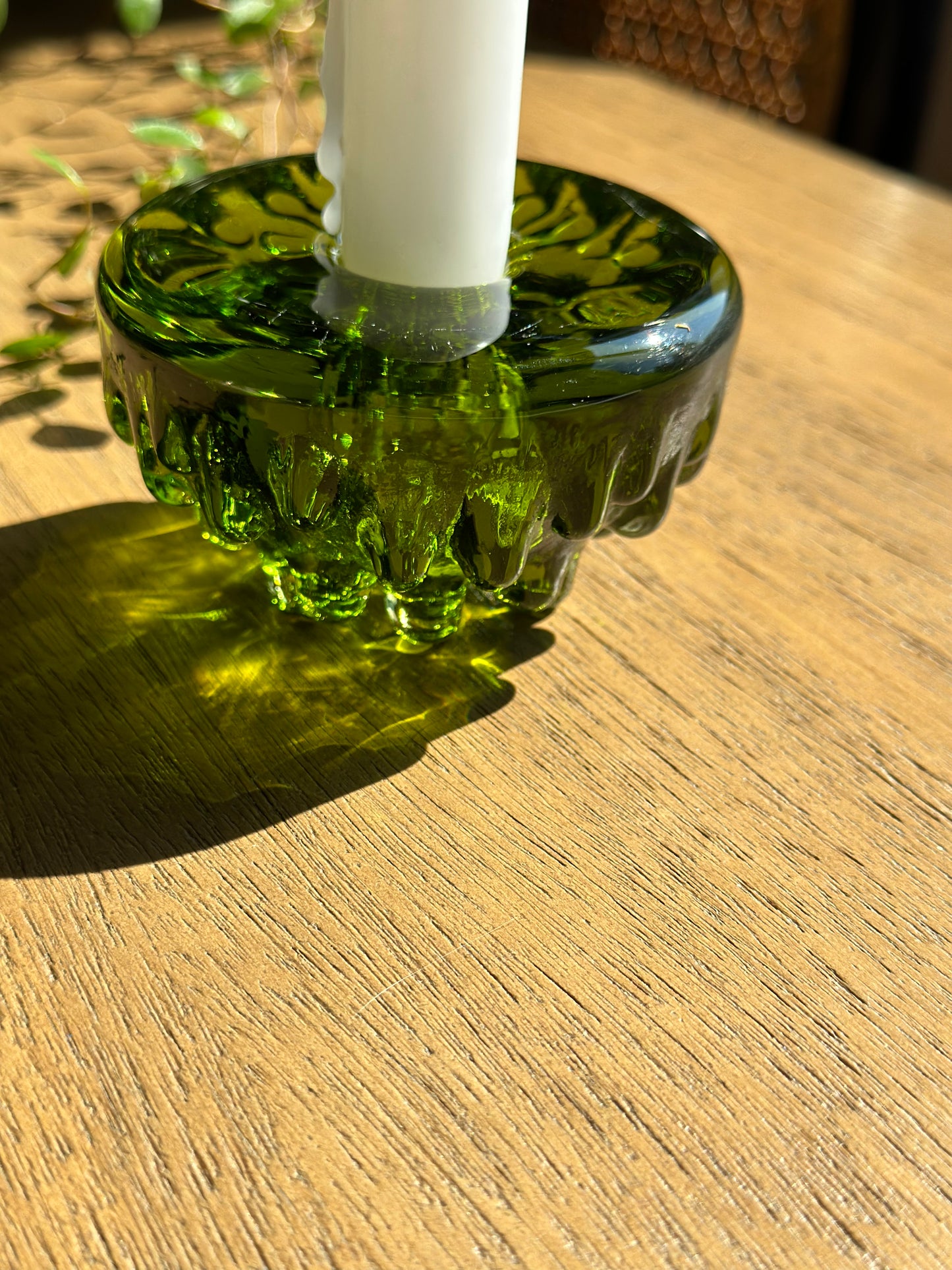 Green glass candleholder