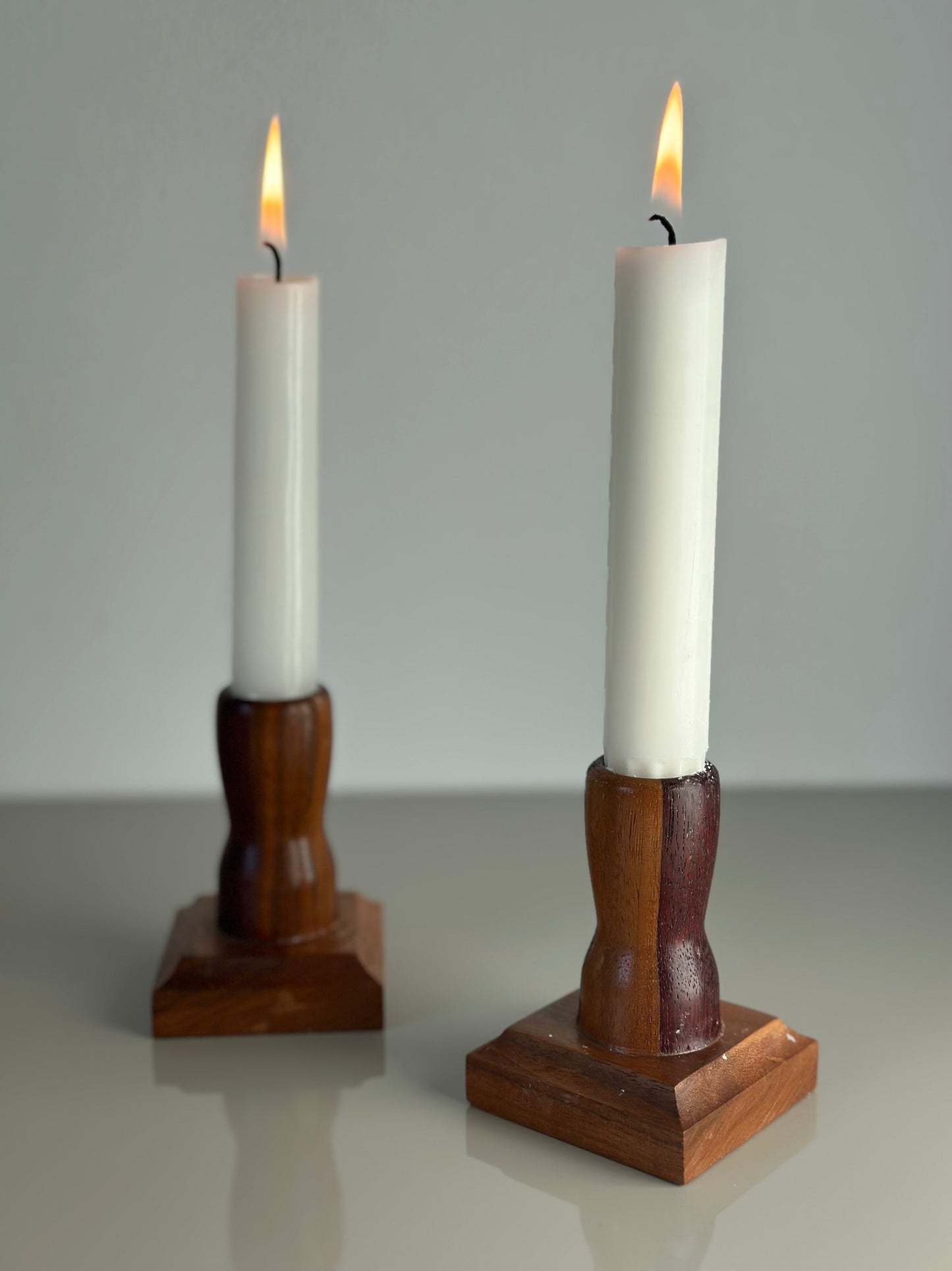 Two wooden candlesticks