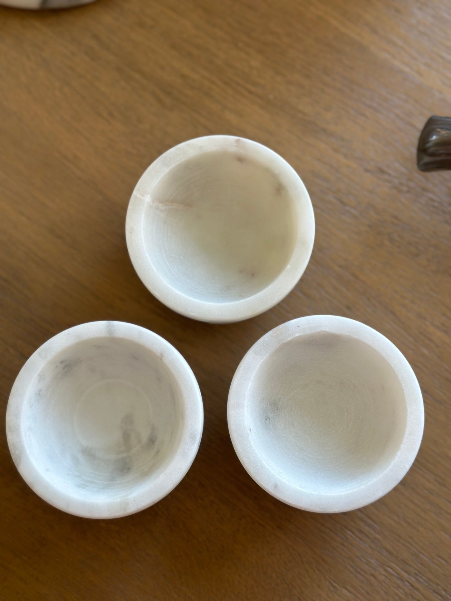 Three mini marble dishes