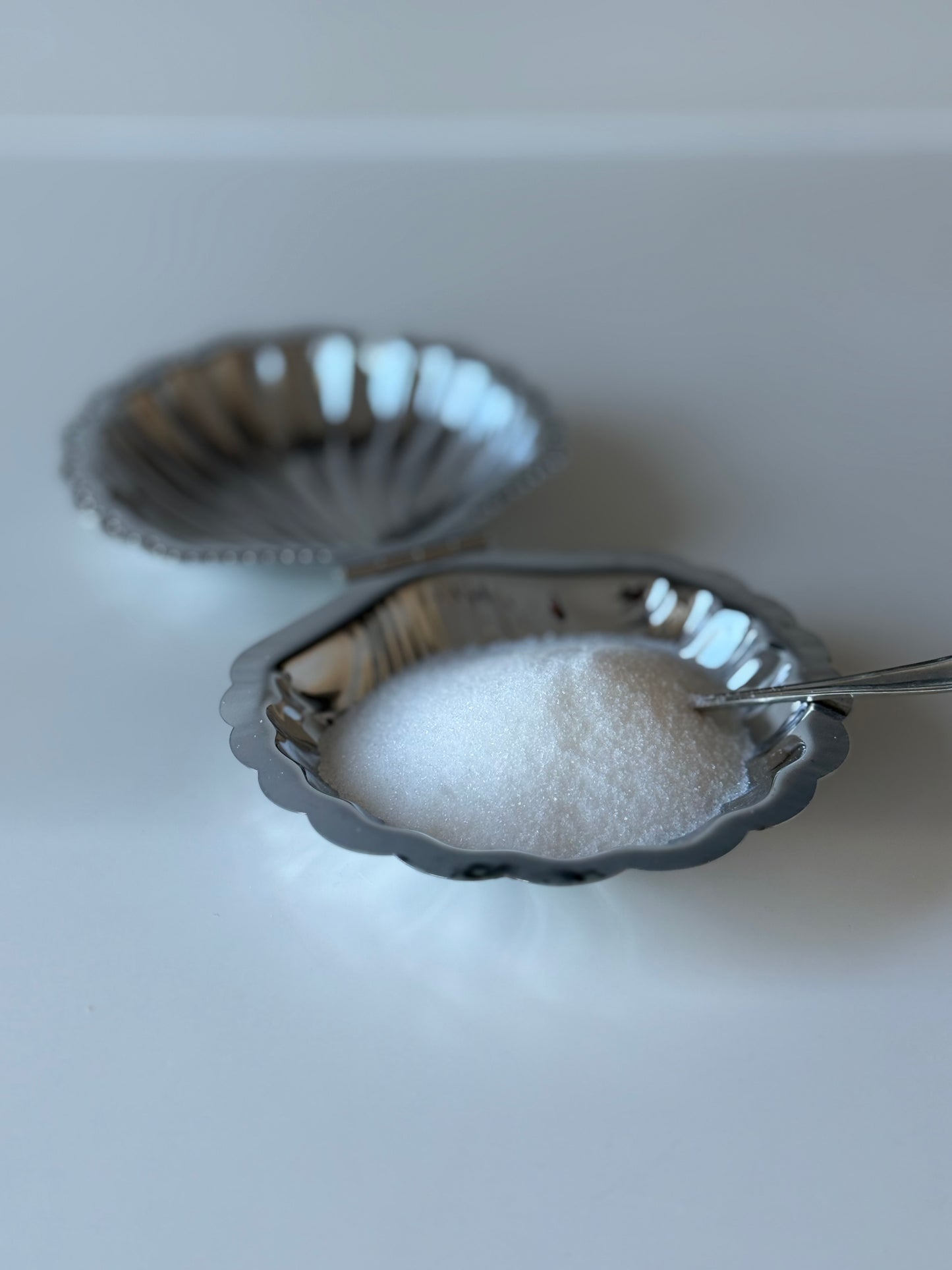 vintage  shell-shaped dish with a spoon