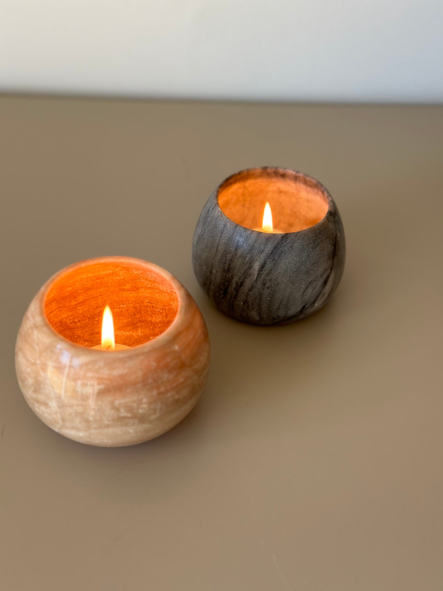 Two marble candleholders