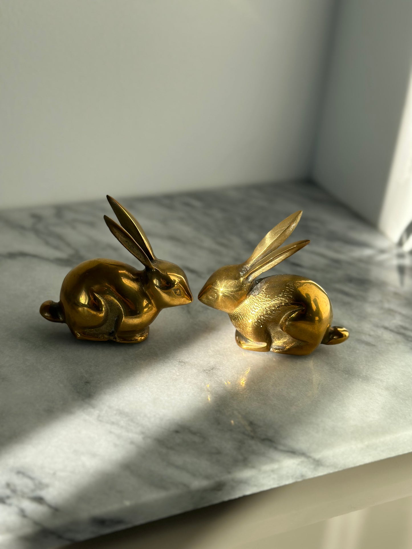 Two brass rabbits