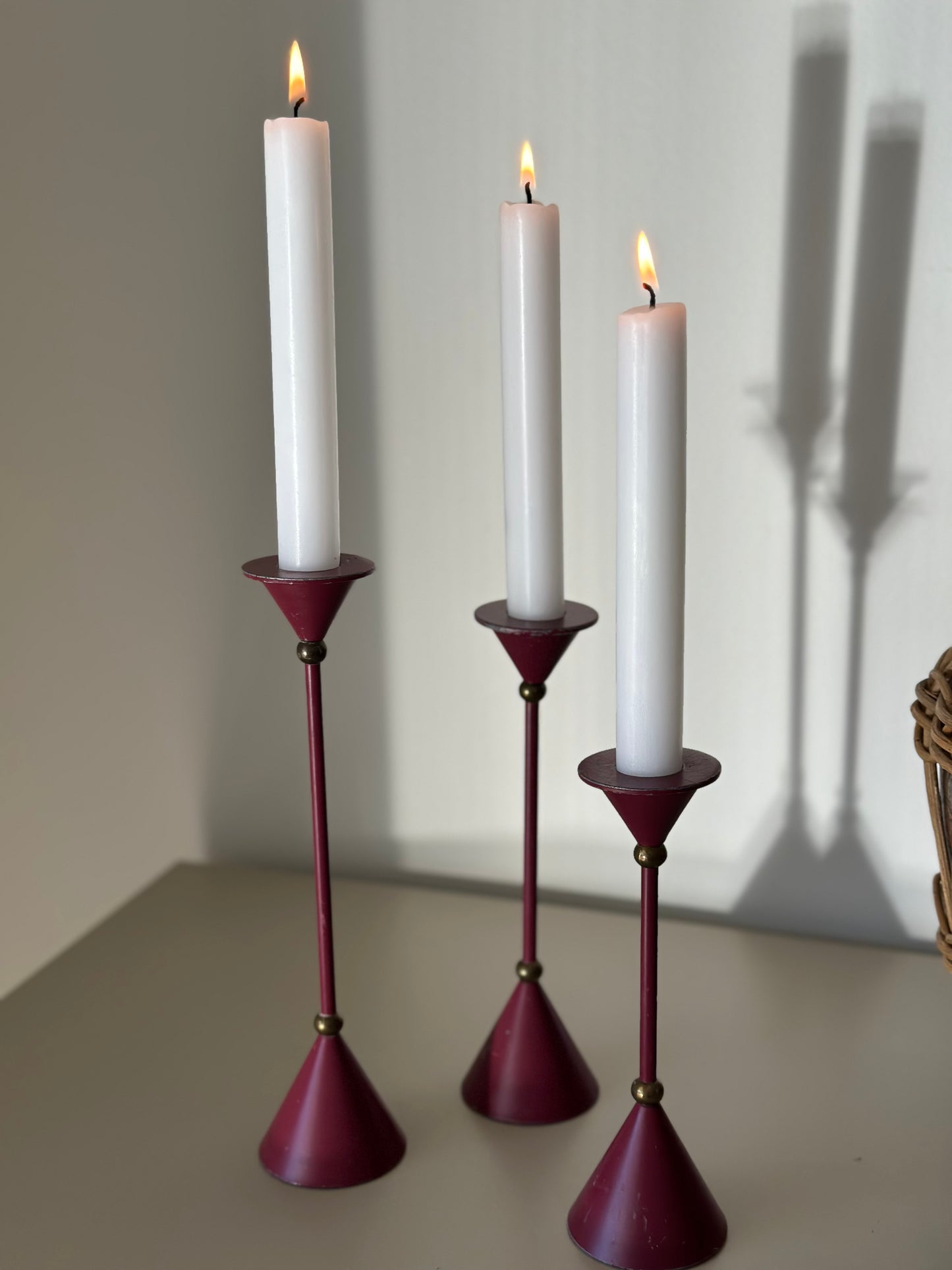 Three purple candleholders