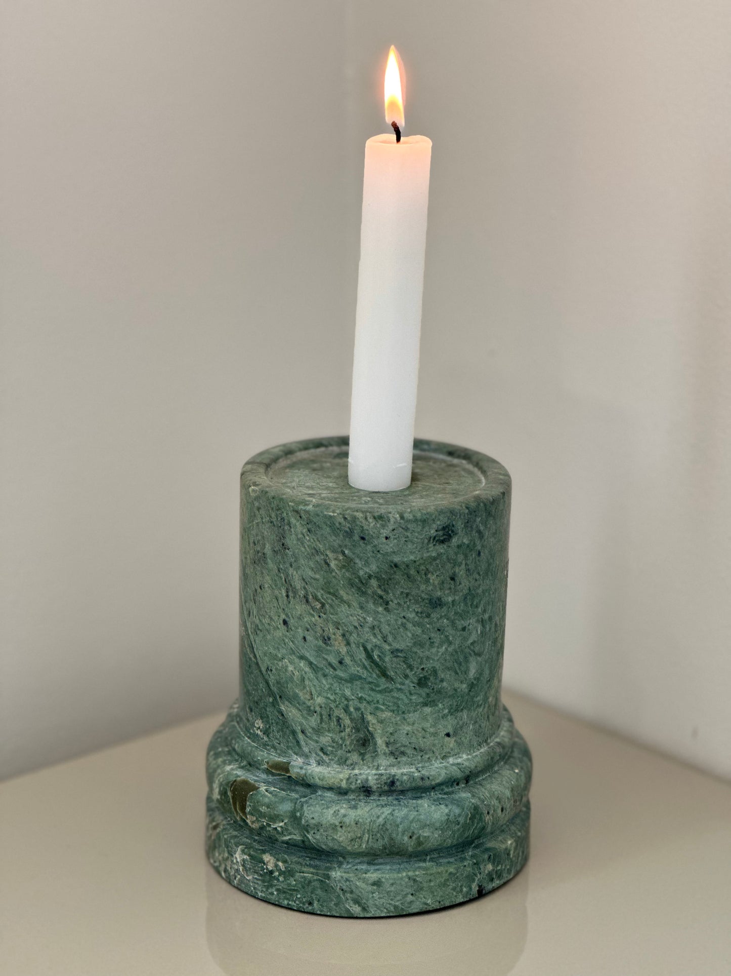 Green marble column candleholder