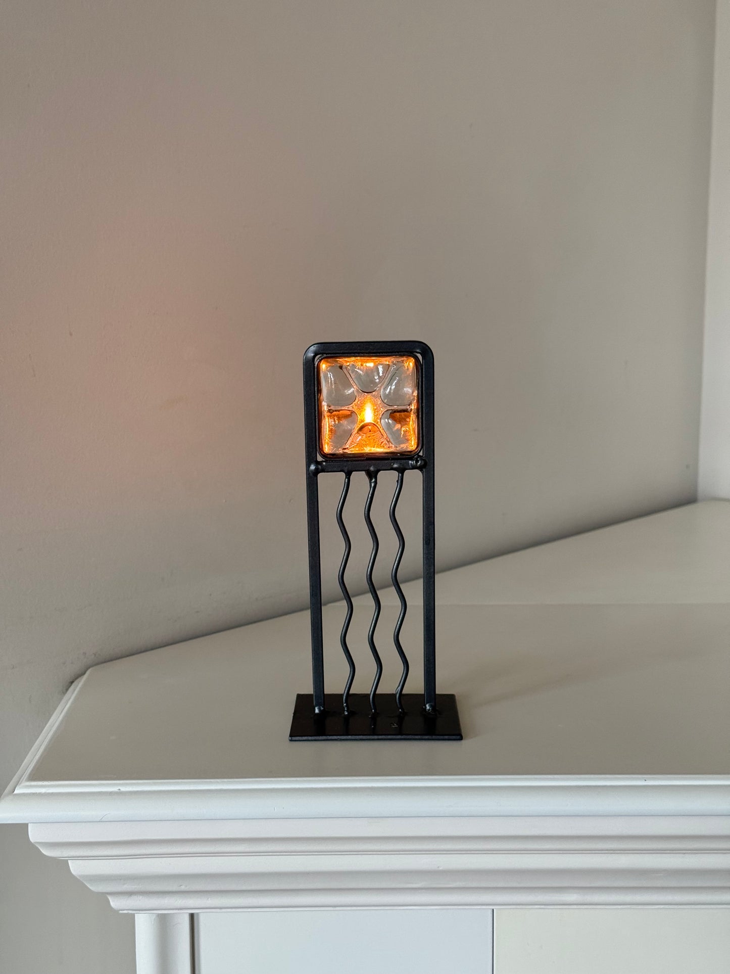 sculptural metal candle holder