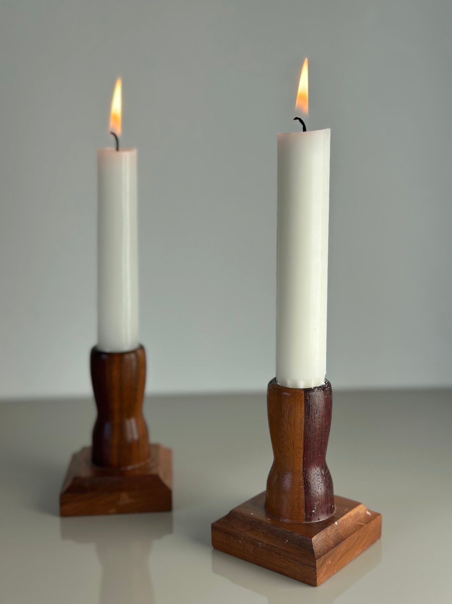 Two wooden candlesticks