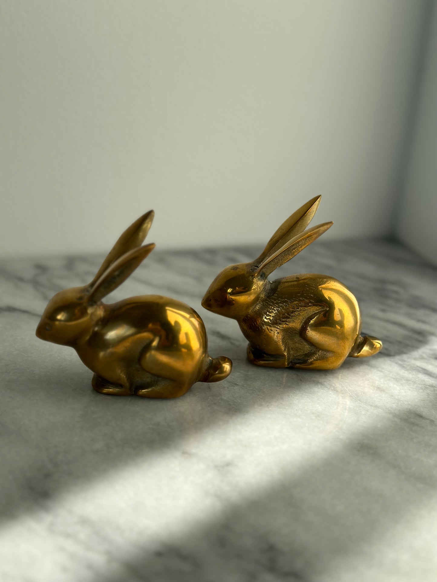 Two brass rabbits