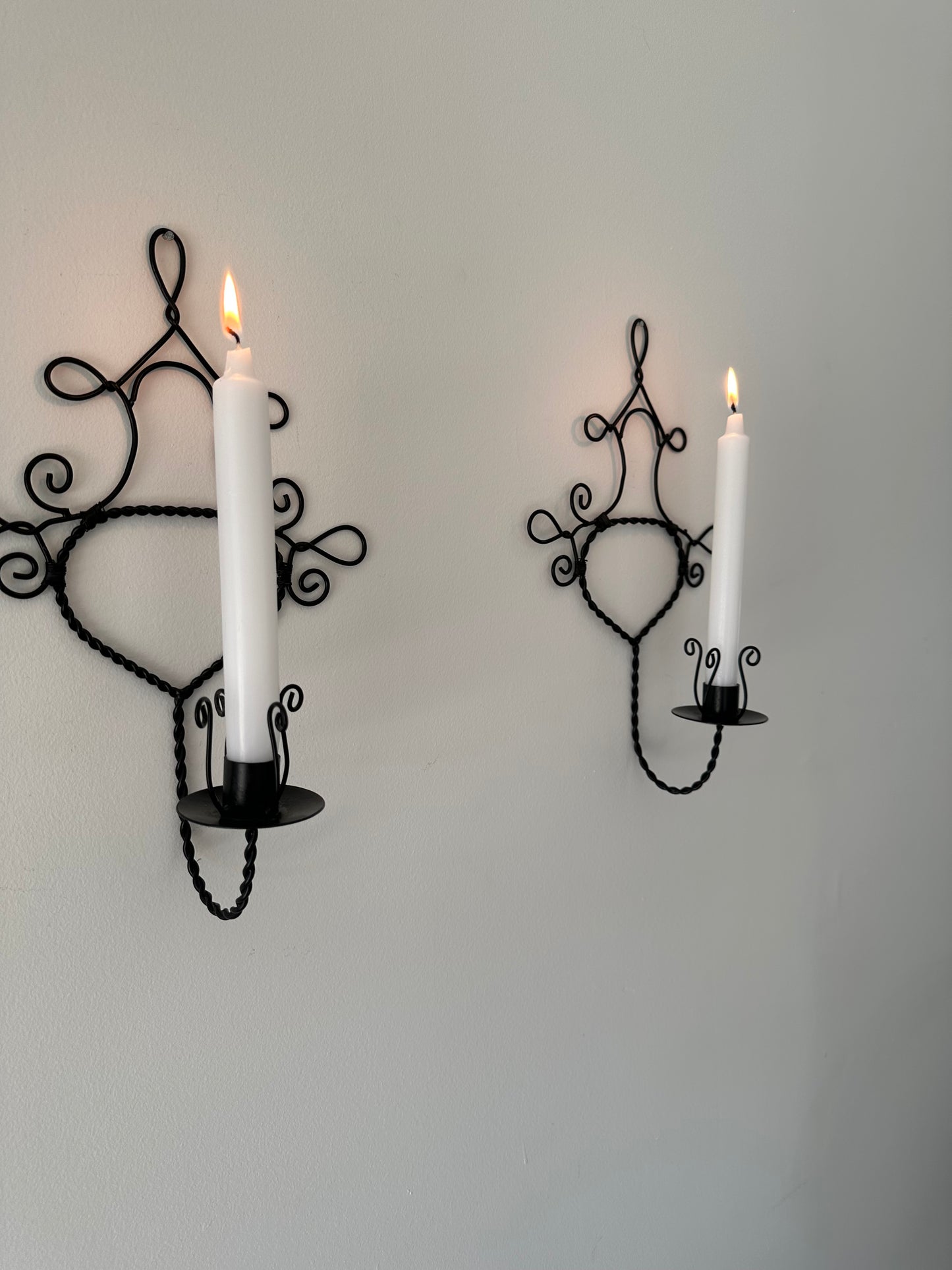 Two metal sconces