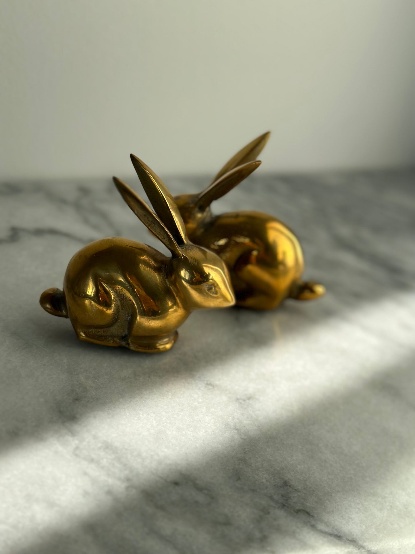 Two brass rabbits