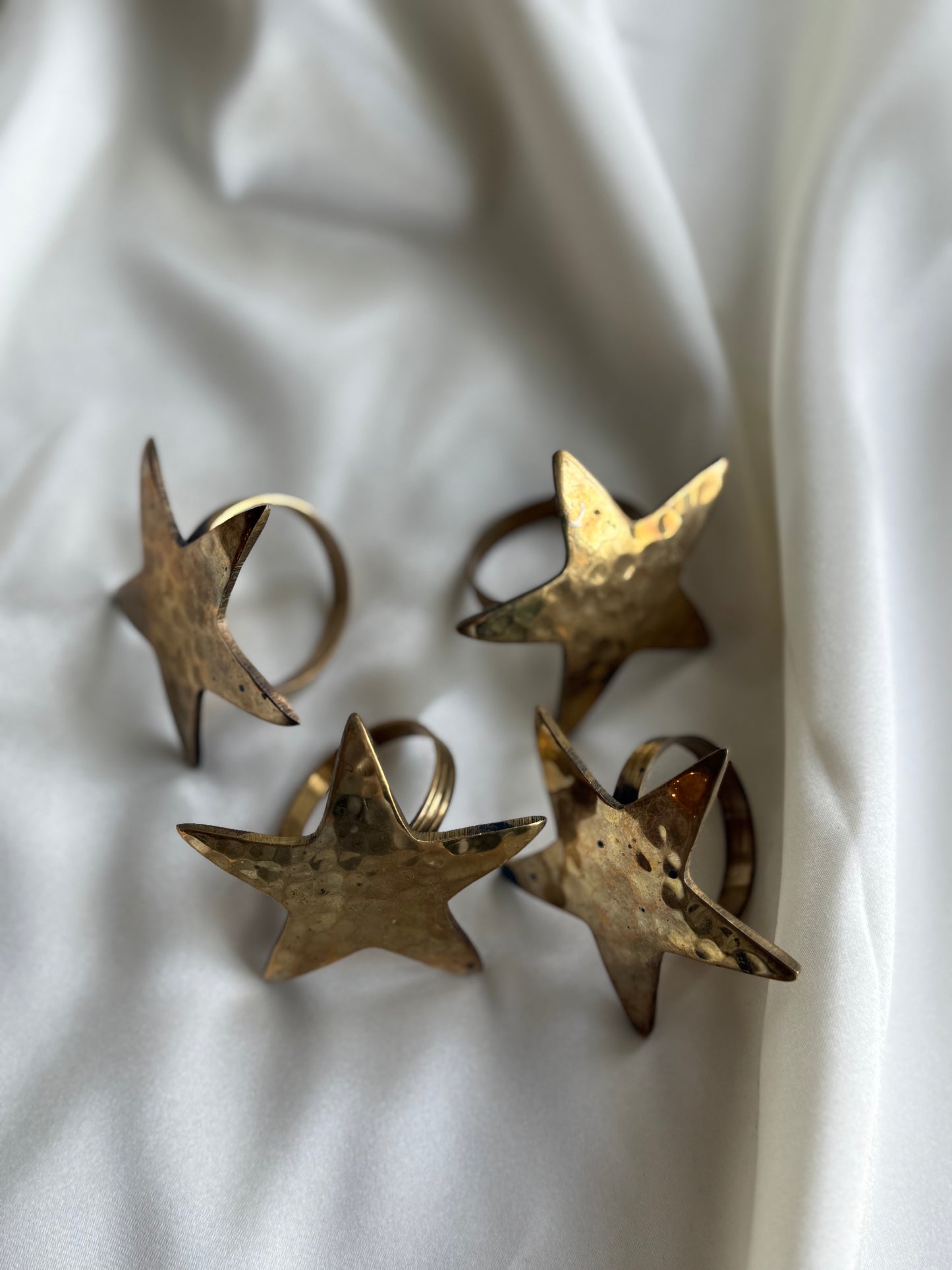 Brass star napkin rings