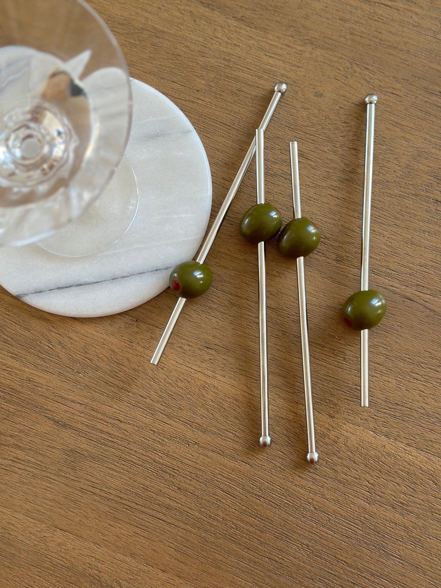 Metal straws with olive