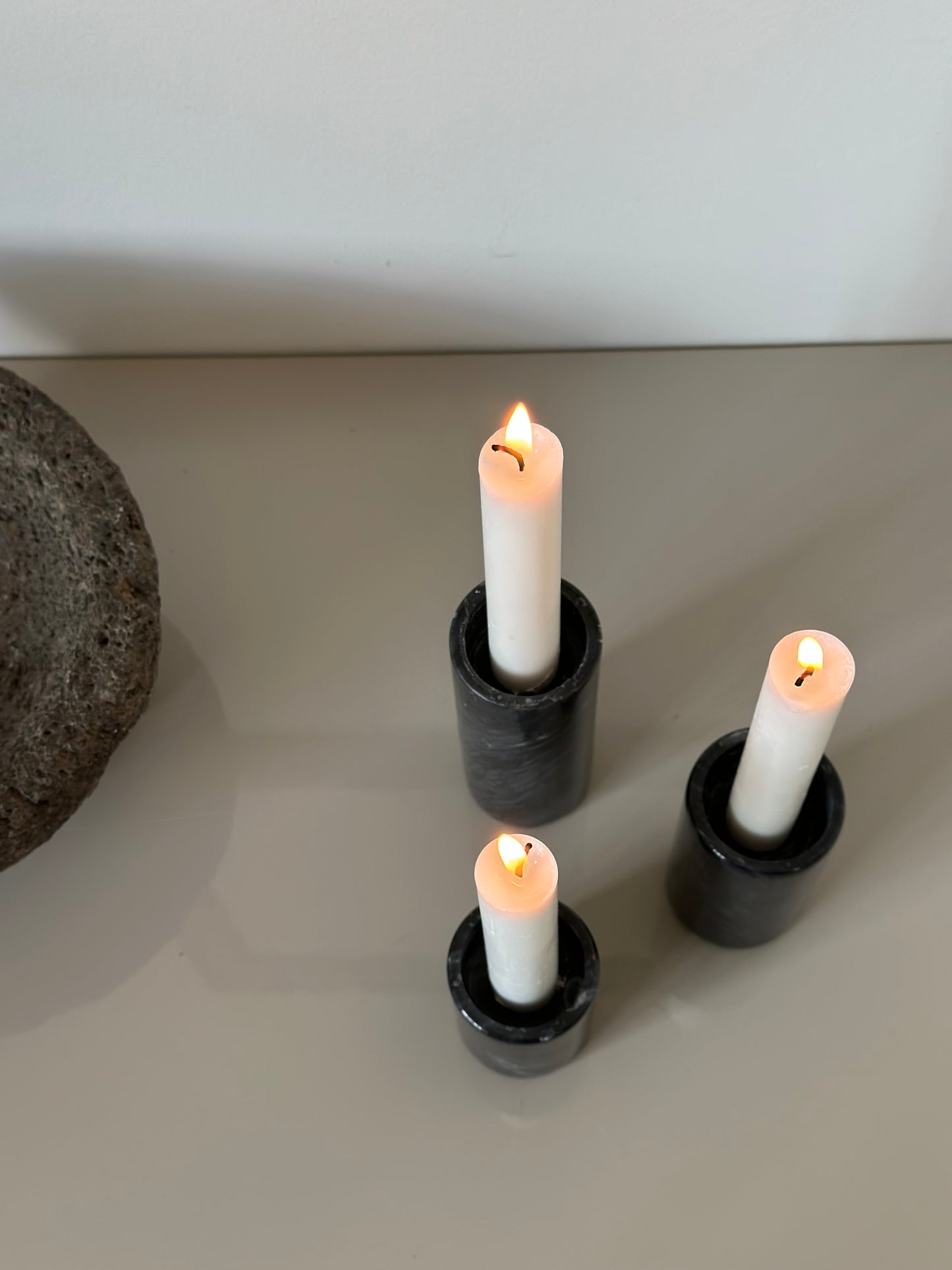 Three marble candleholders