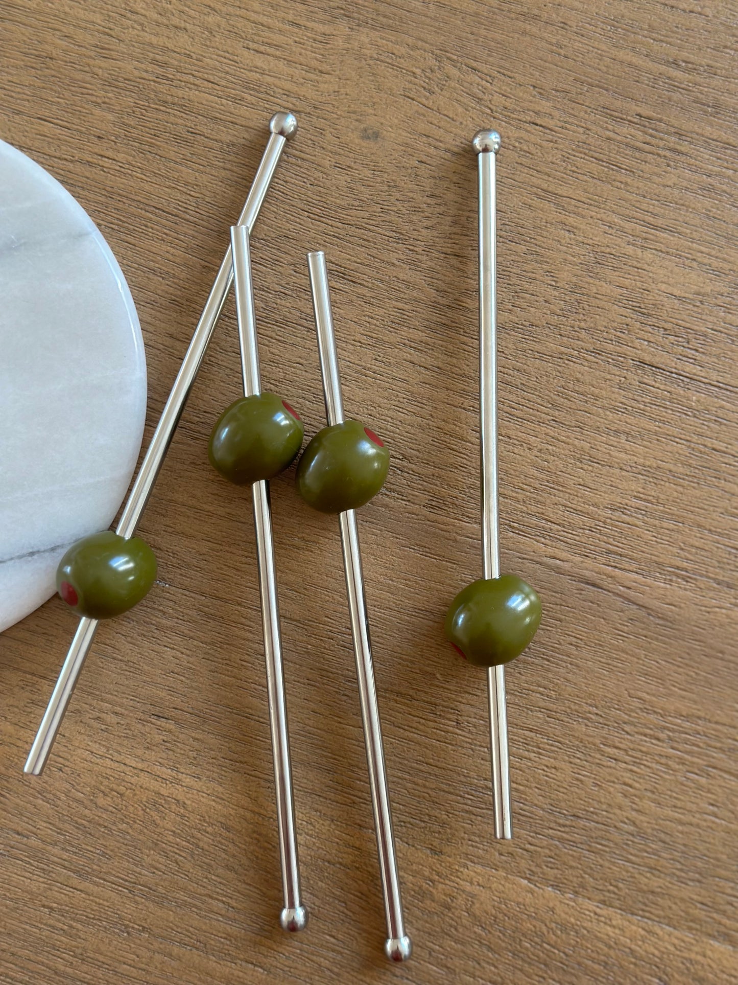 Metal straws with olive