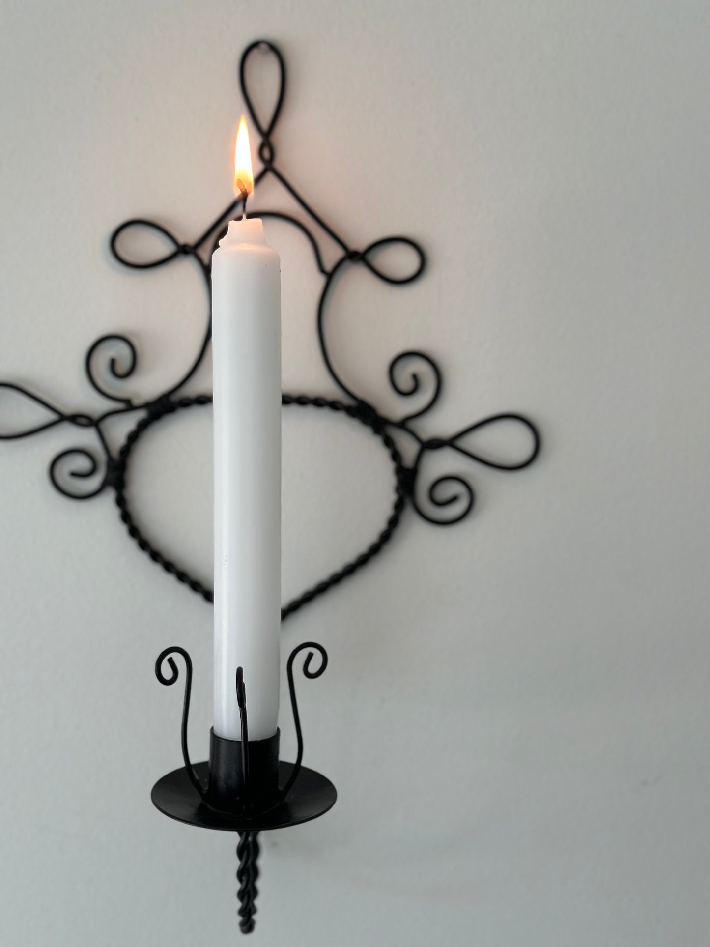 Two metal sconces