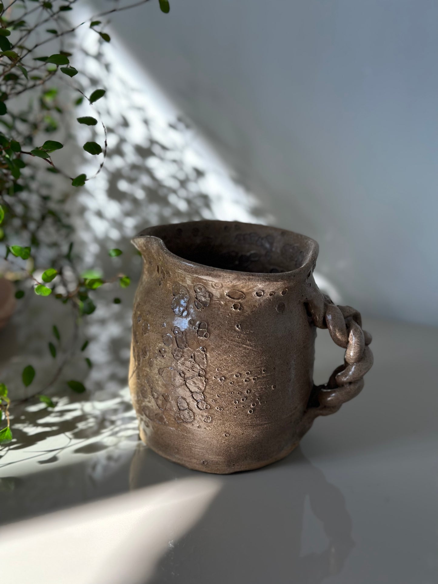 Handcrafted ceramic pitcher