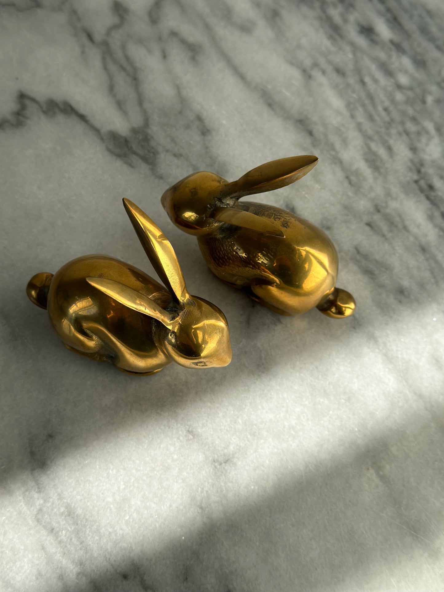 Two brass rabbits