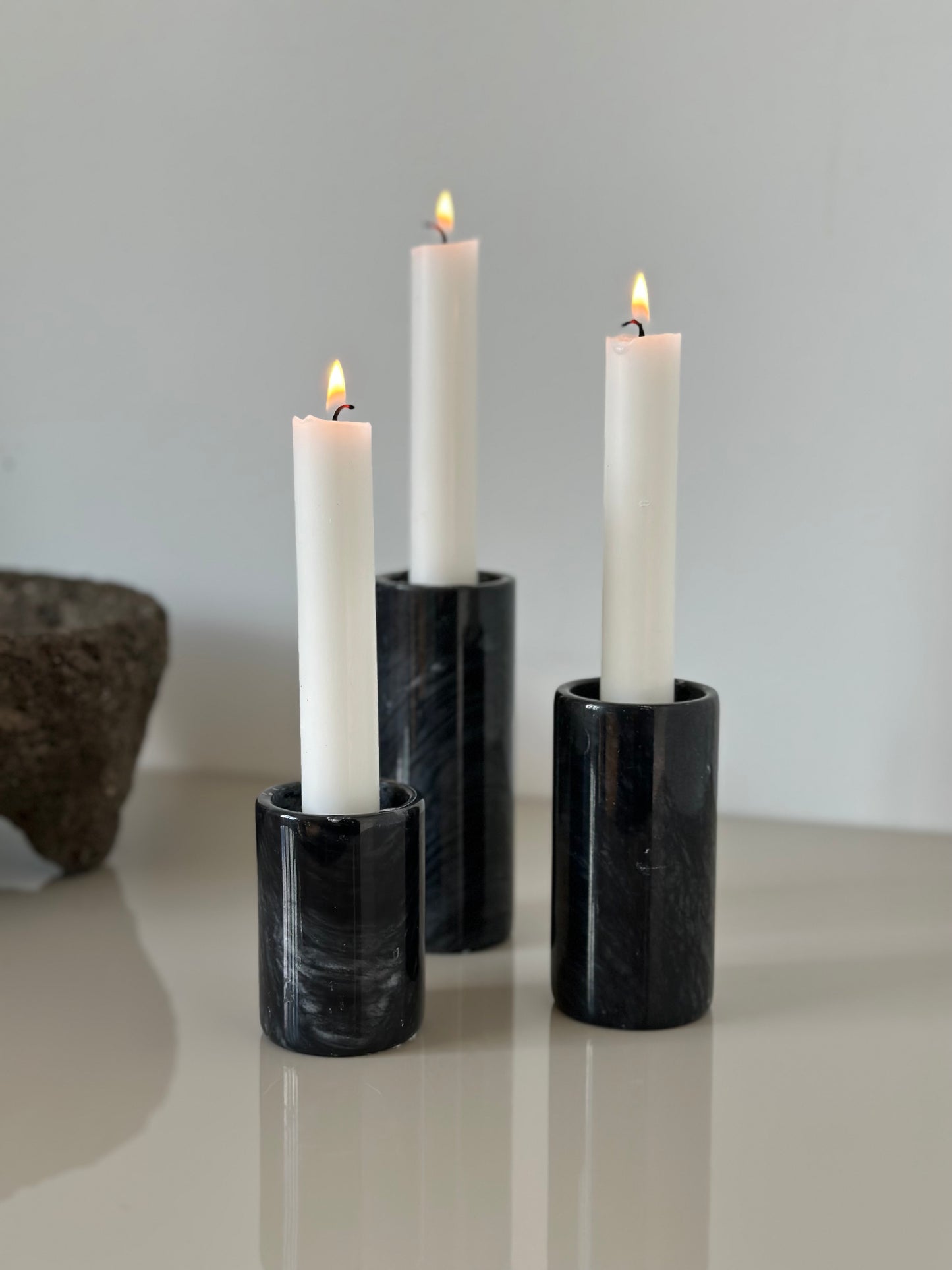 Three marble candleholders