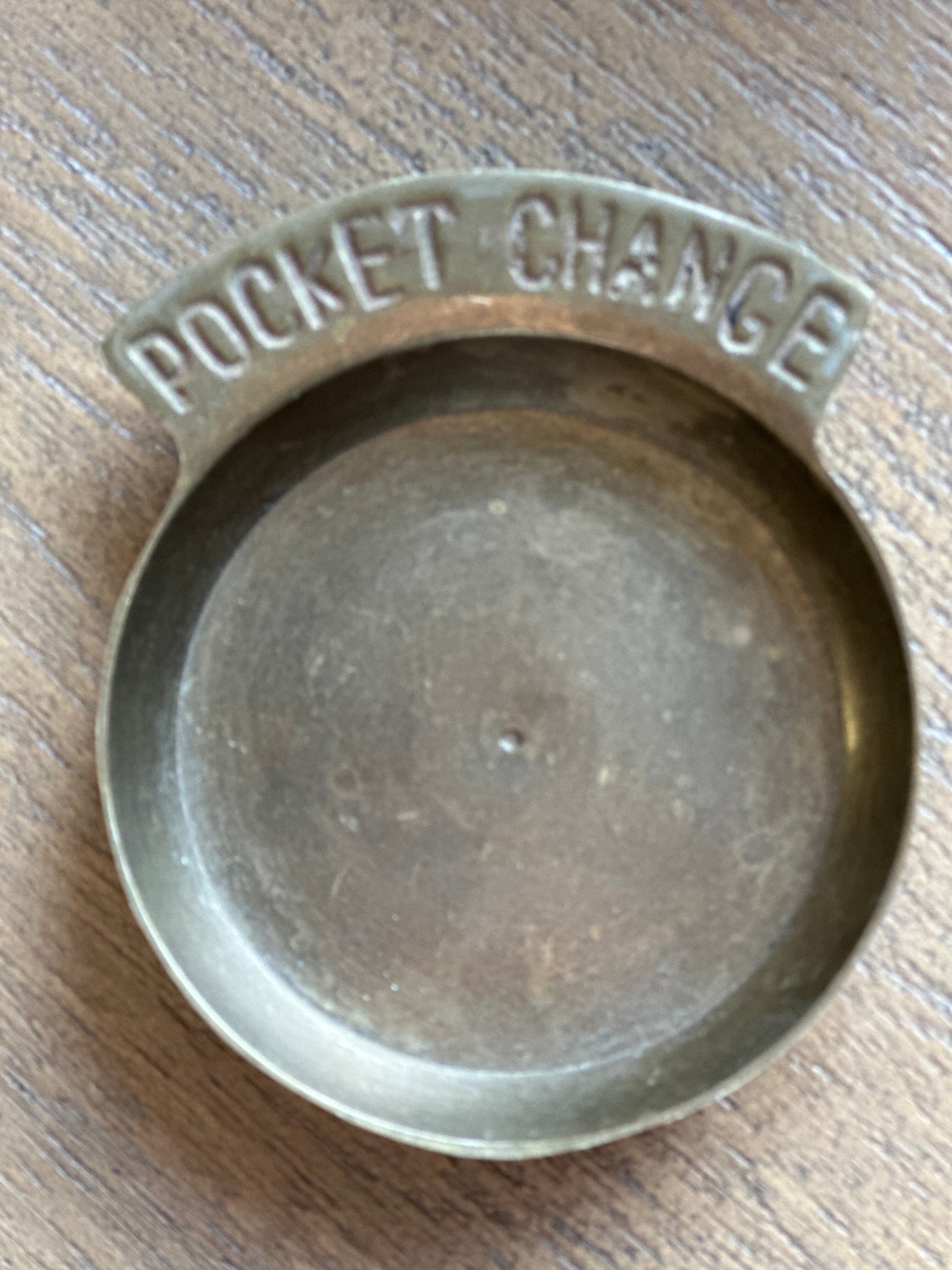 Brass change holder