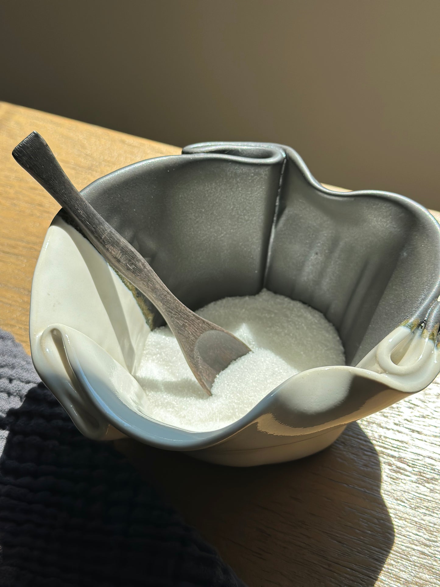 Pottery sugar bowl with spoon