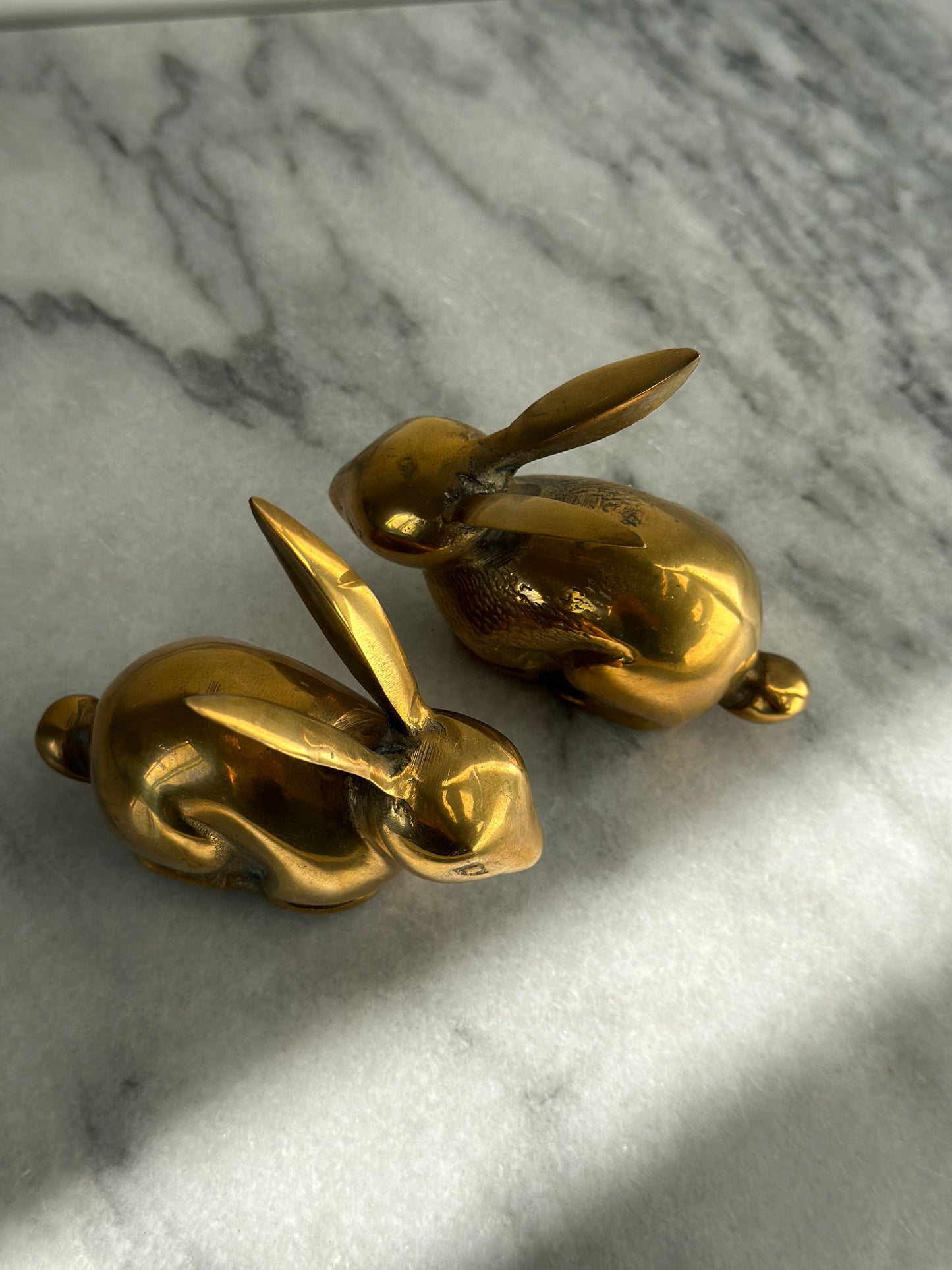 Two brass rabbits