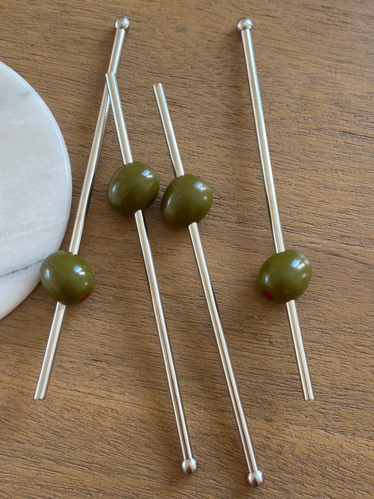 Metal straws with olive