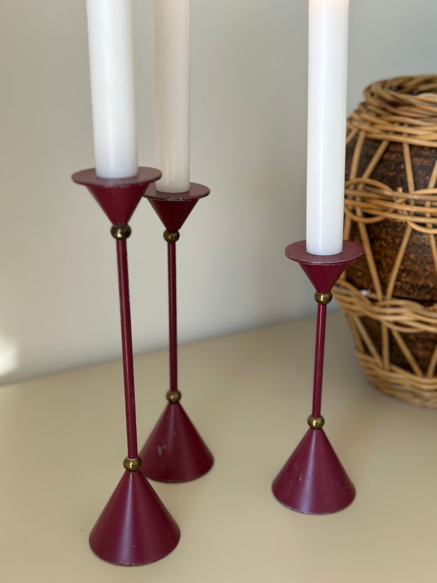 Three purple candleholders