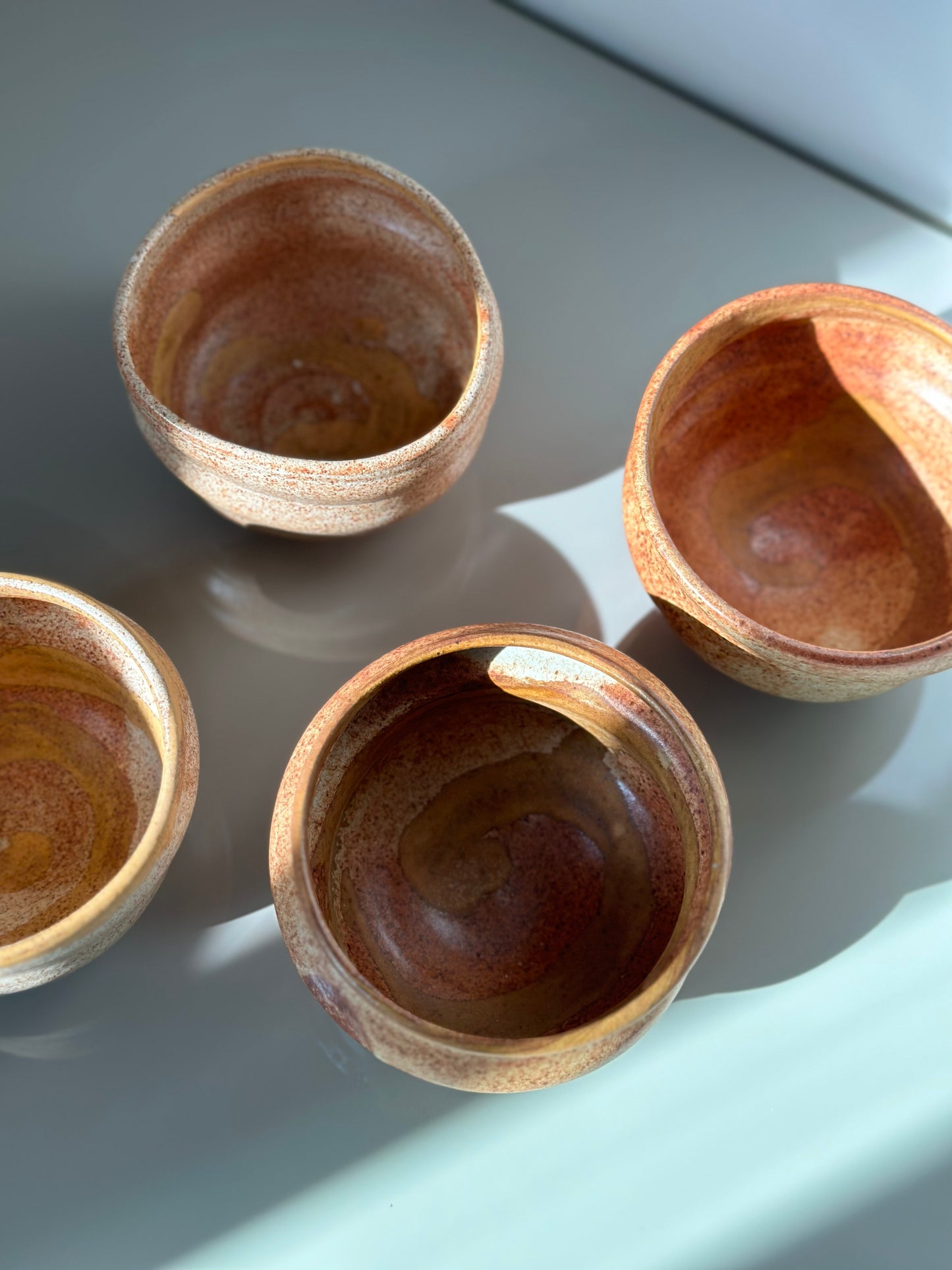 Four handmade ceramic bowls