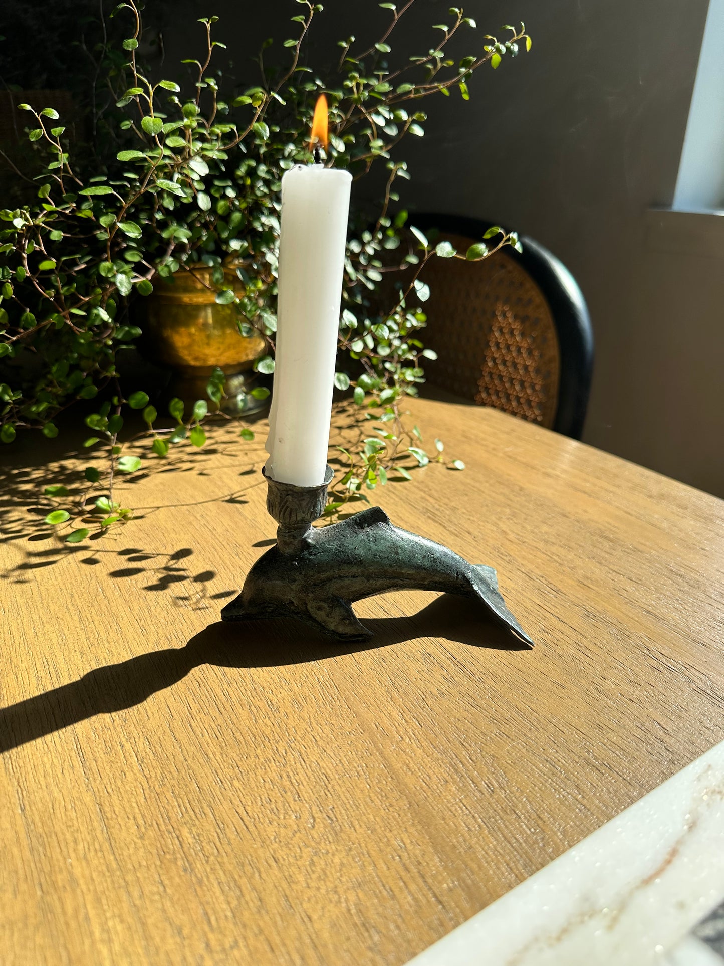 Iron dolphin candleholder