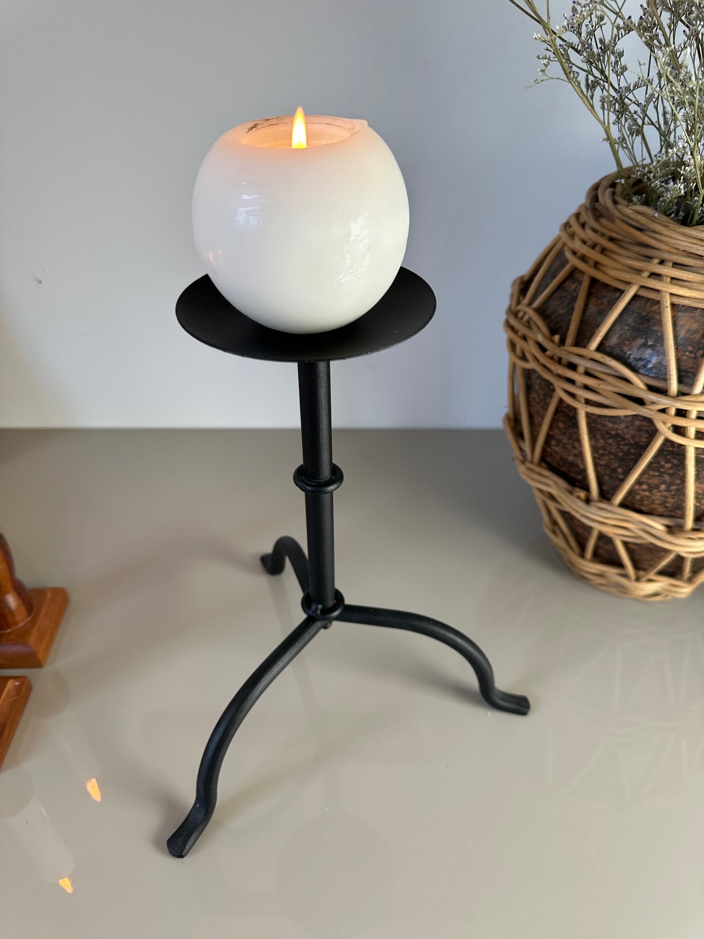 Primitive black candleholder