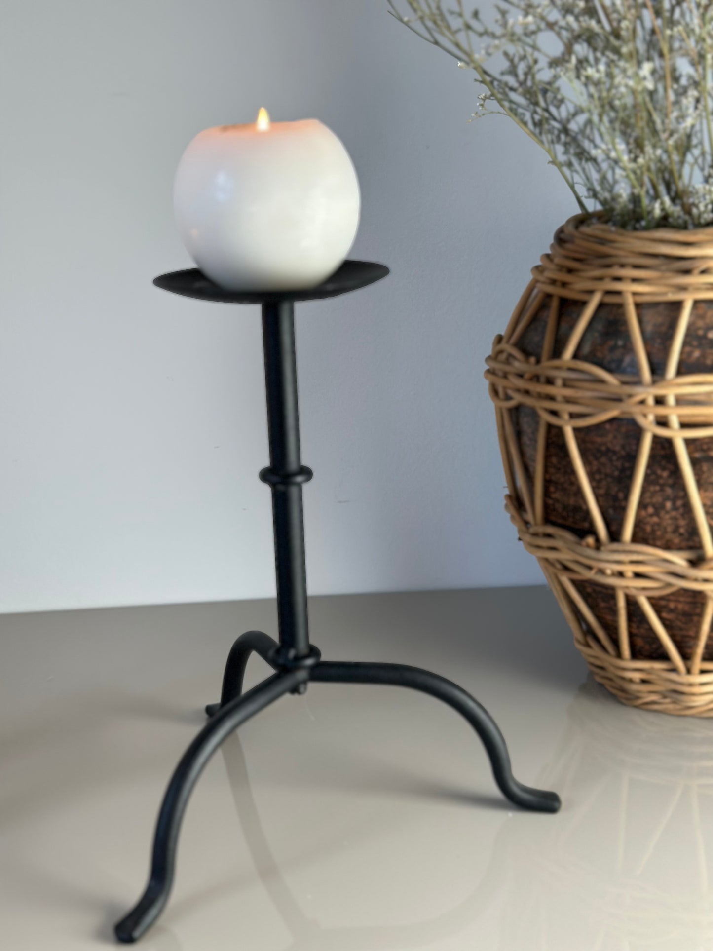 Primitive black candleholder