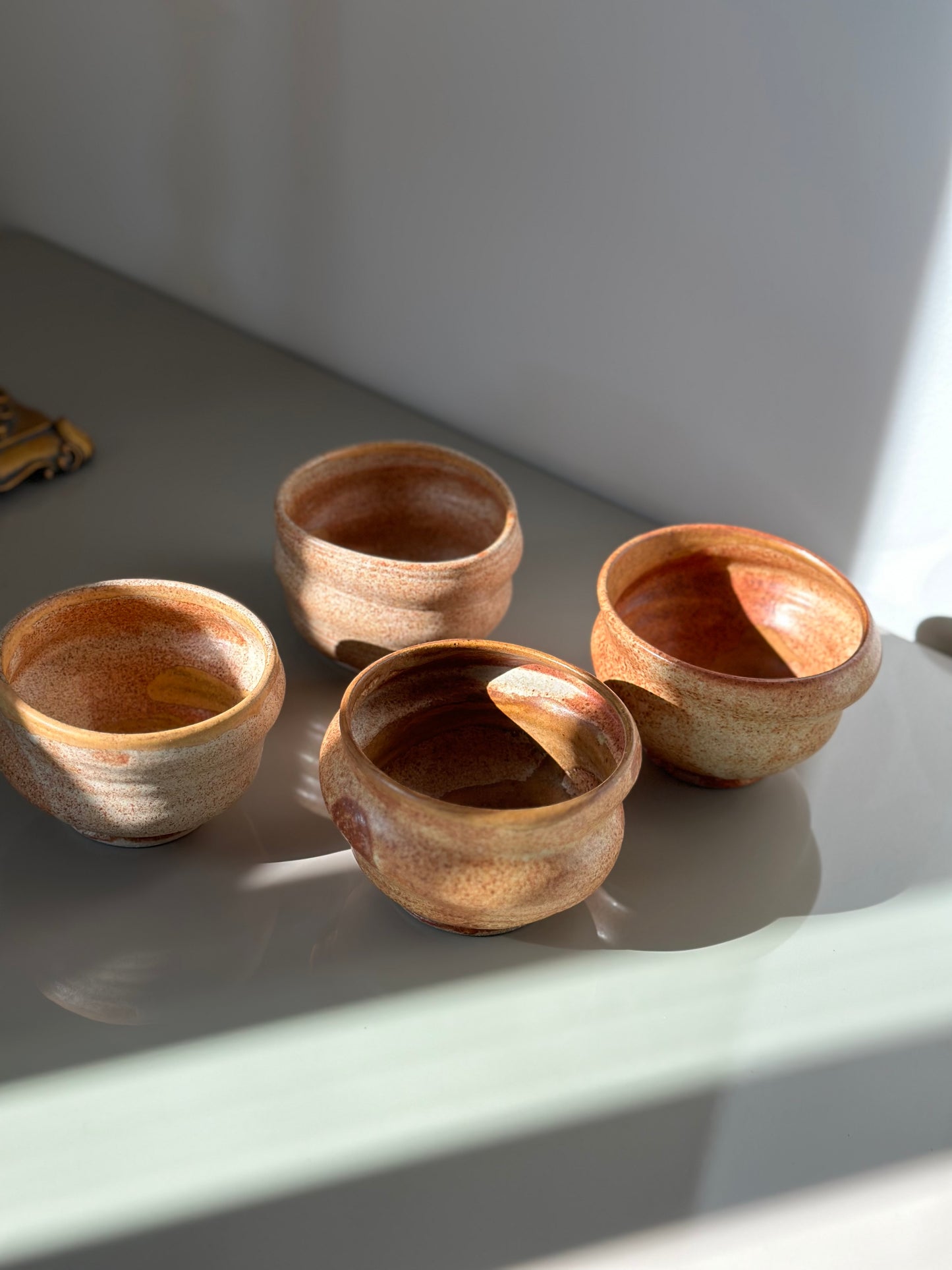 Four handmade ceramic bowls