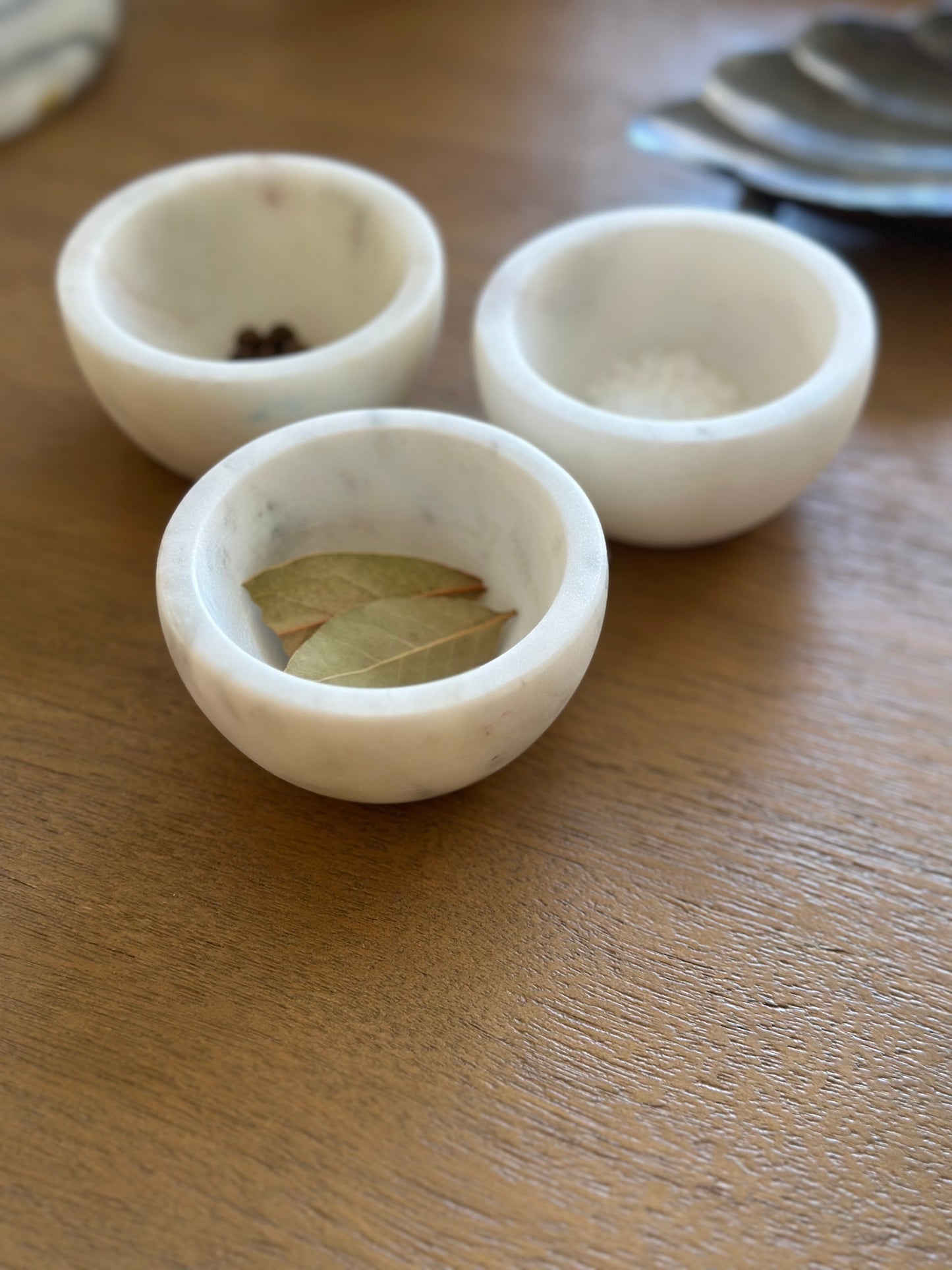 Three mini marble dishes