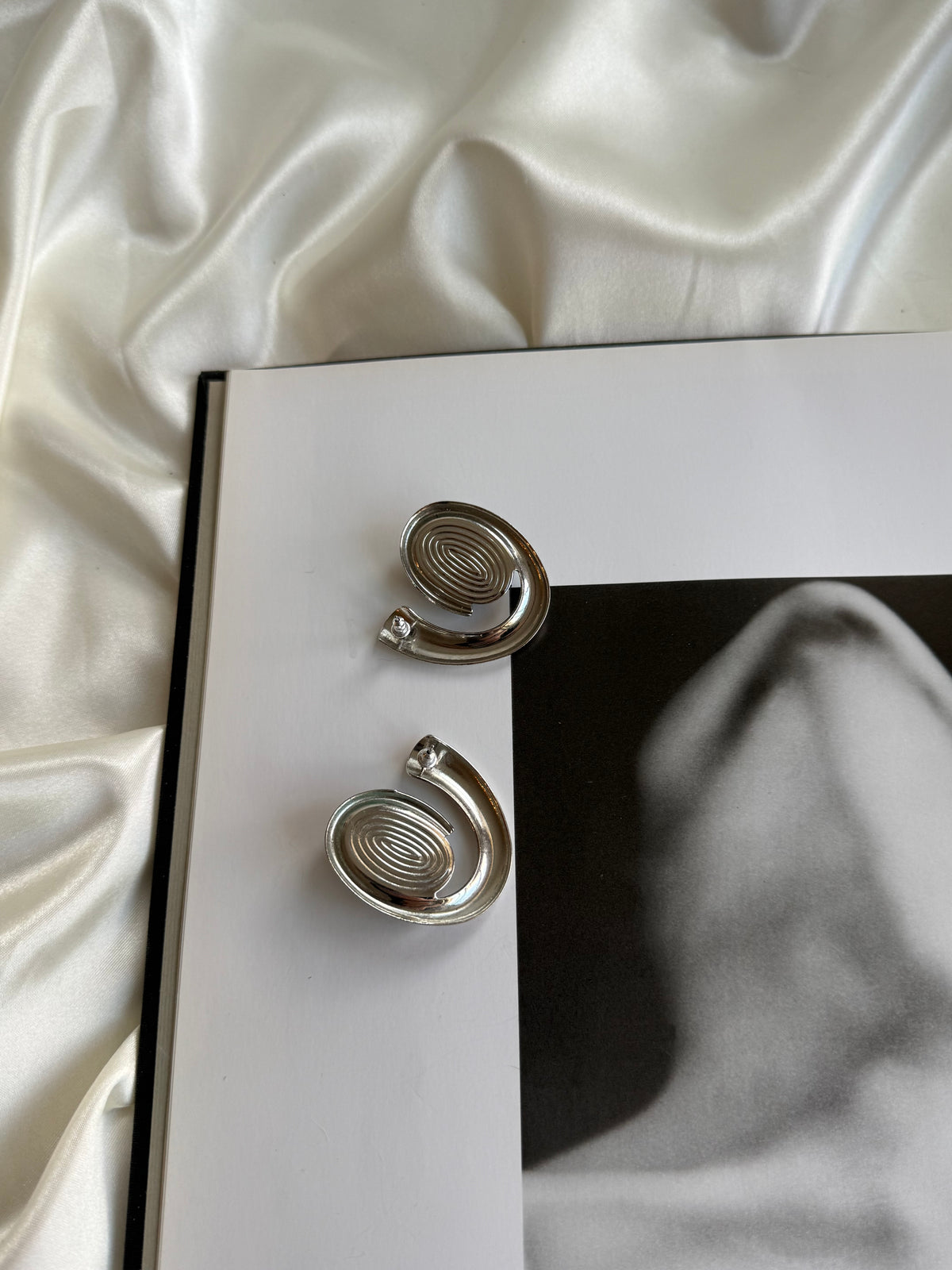 Vintage Silver Tone Spiral Earrings with Black Cabochon Accents
