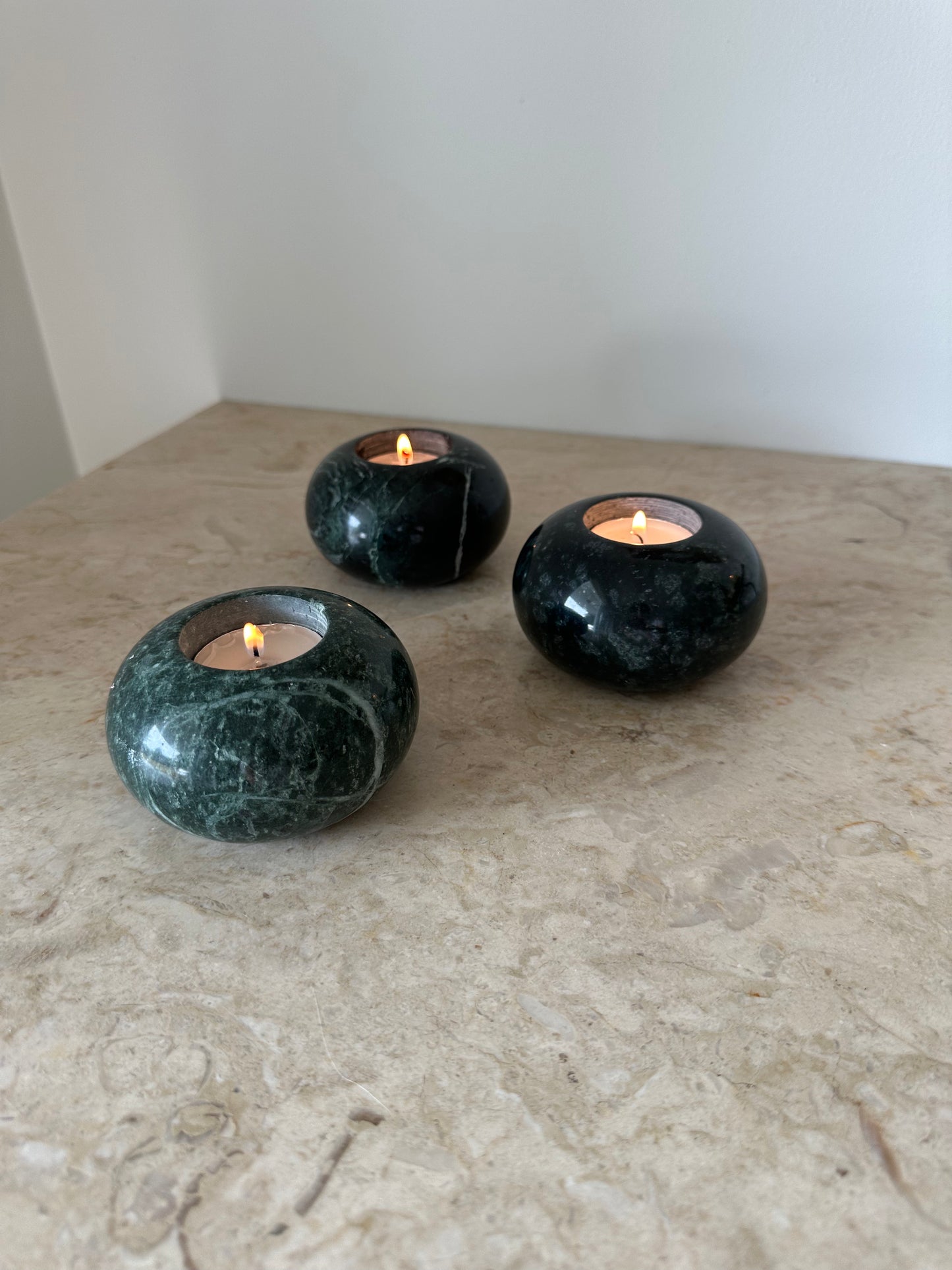 Three green marble tealight holders