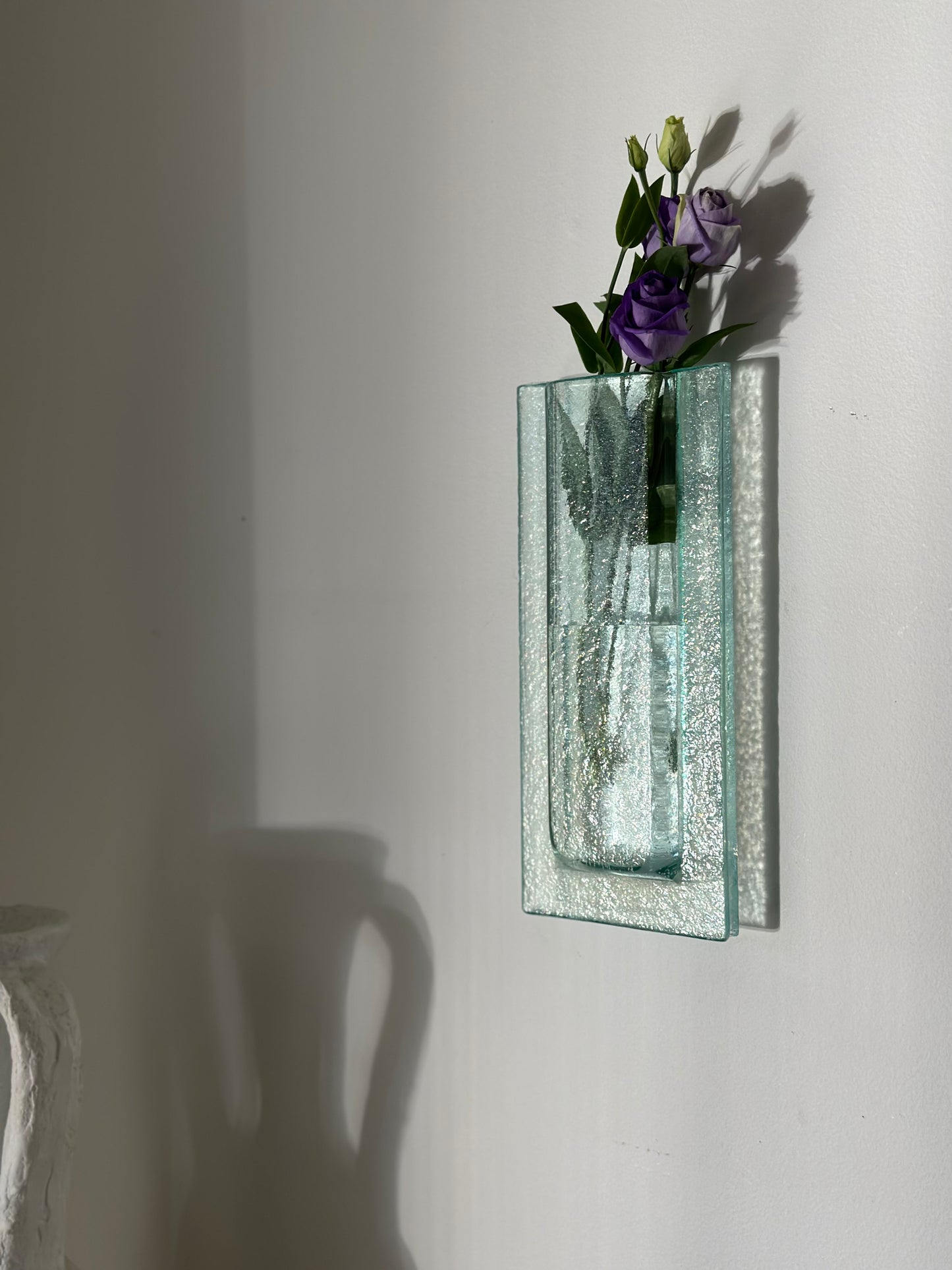 Glass wall hanging vase