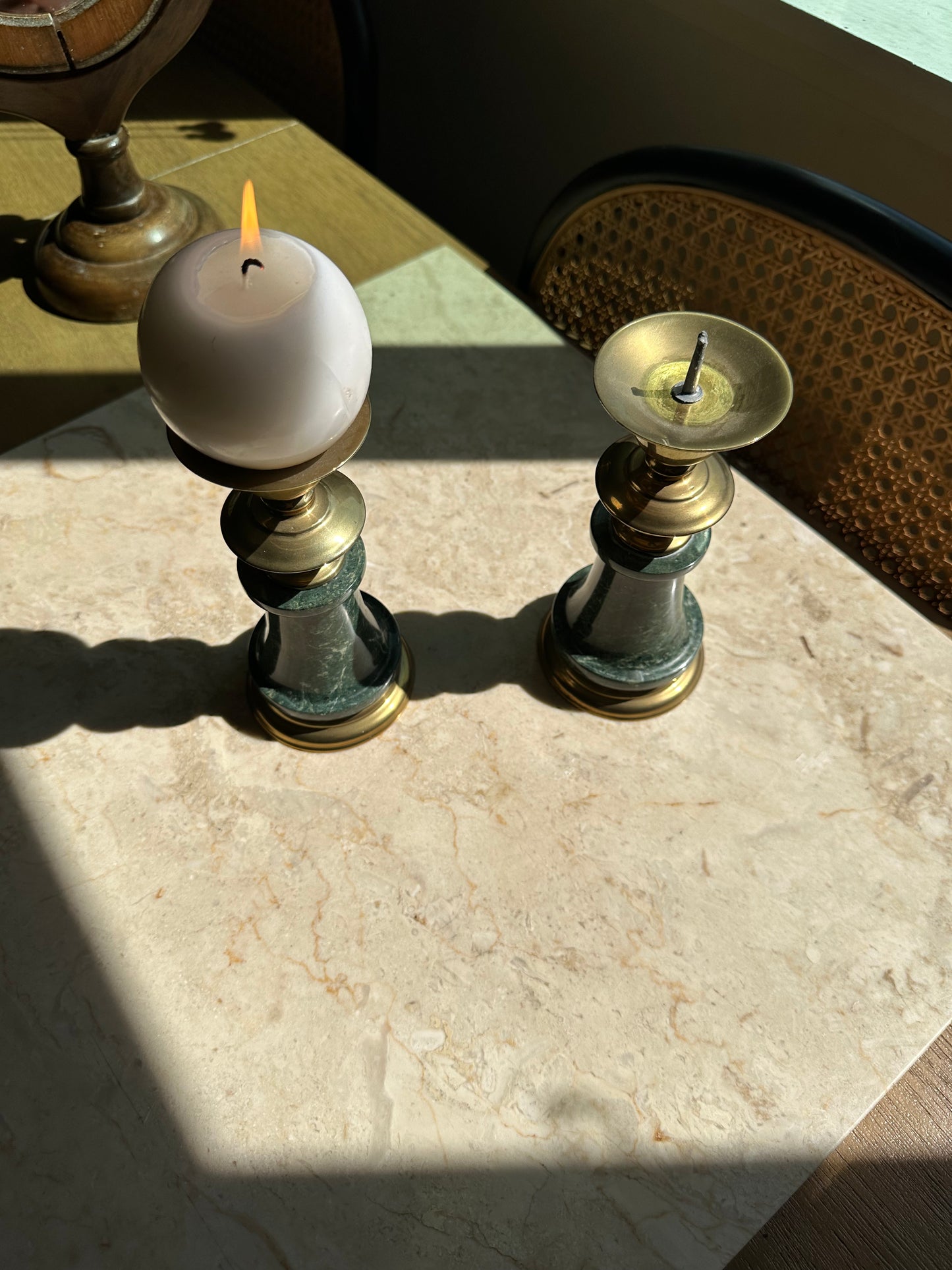 Two brass and marble candleholders