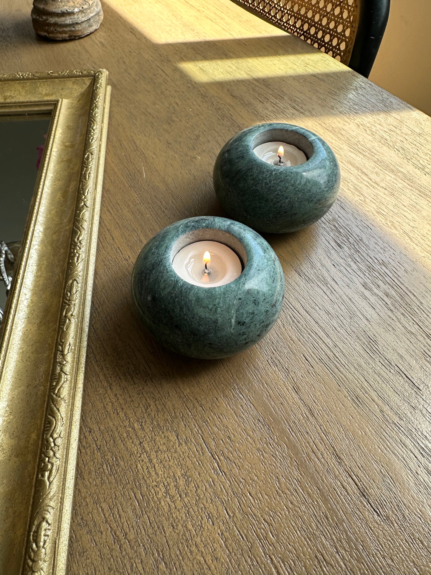 Two light green marble tealight holders