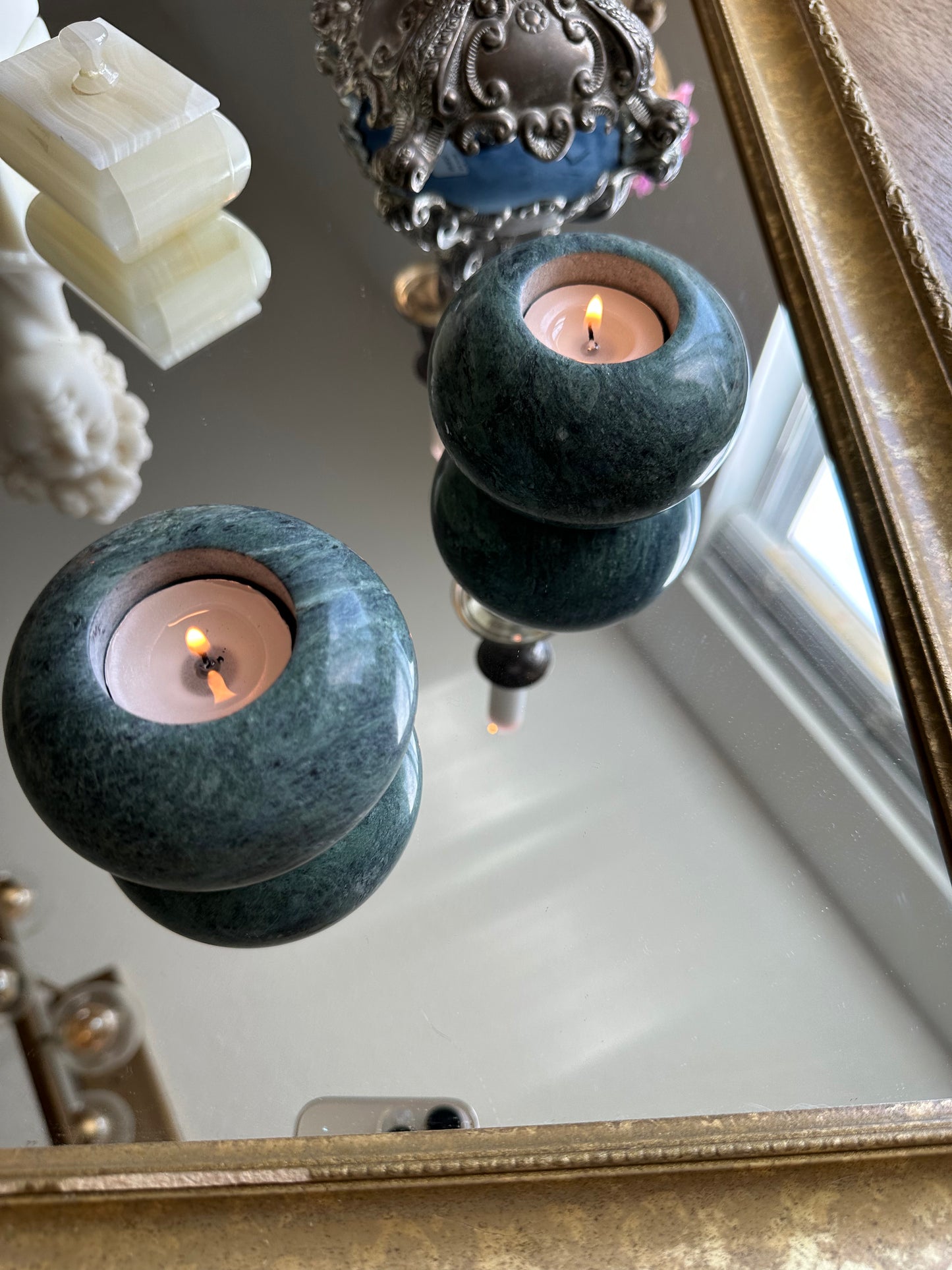 Two light green marble tealight holders