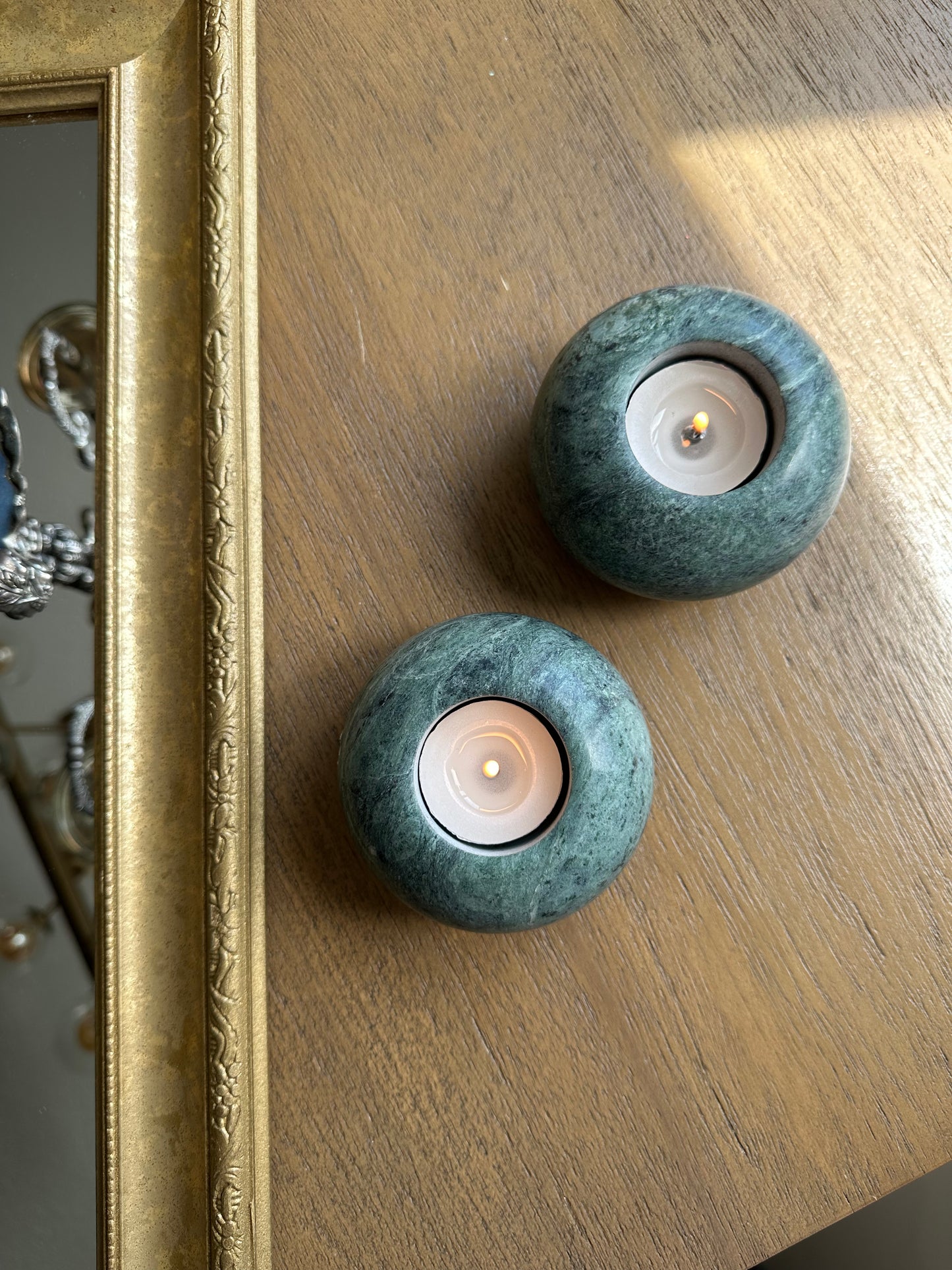 Two light green marble tealight holders