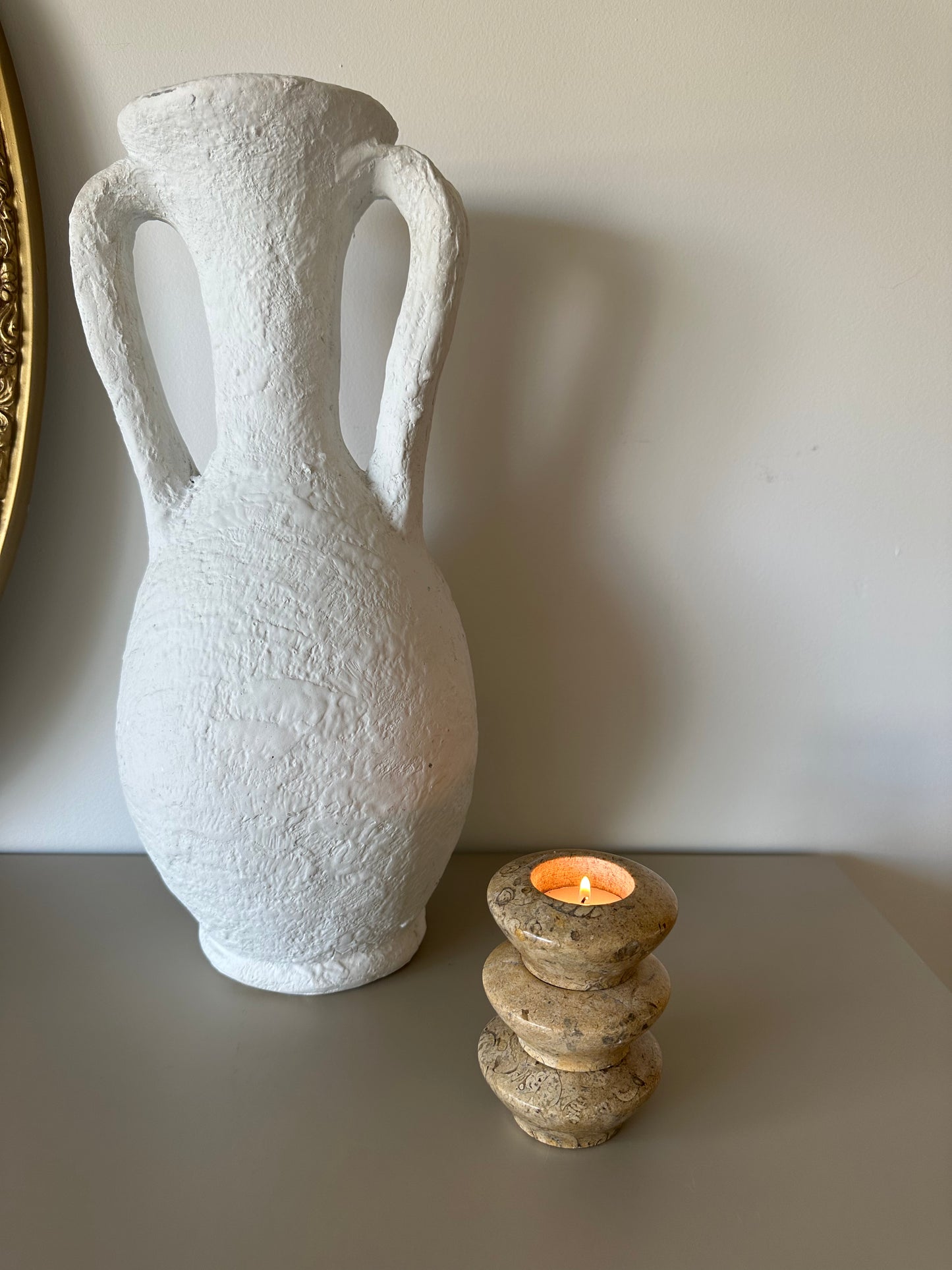 Three fossil tealight holders