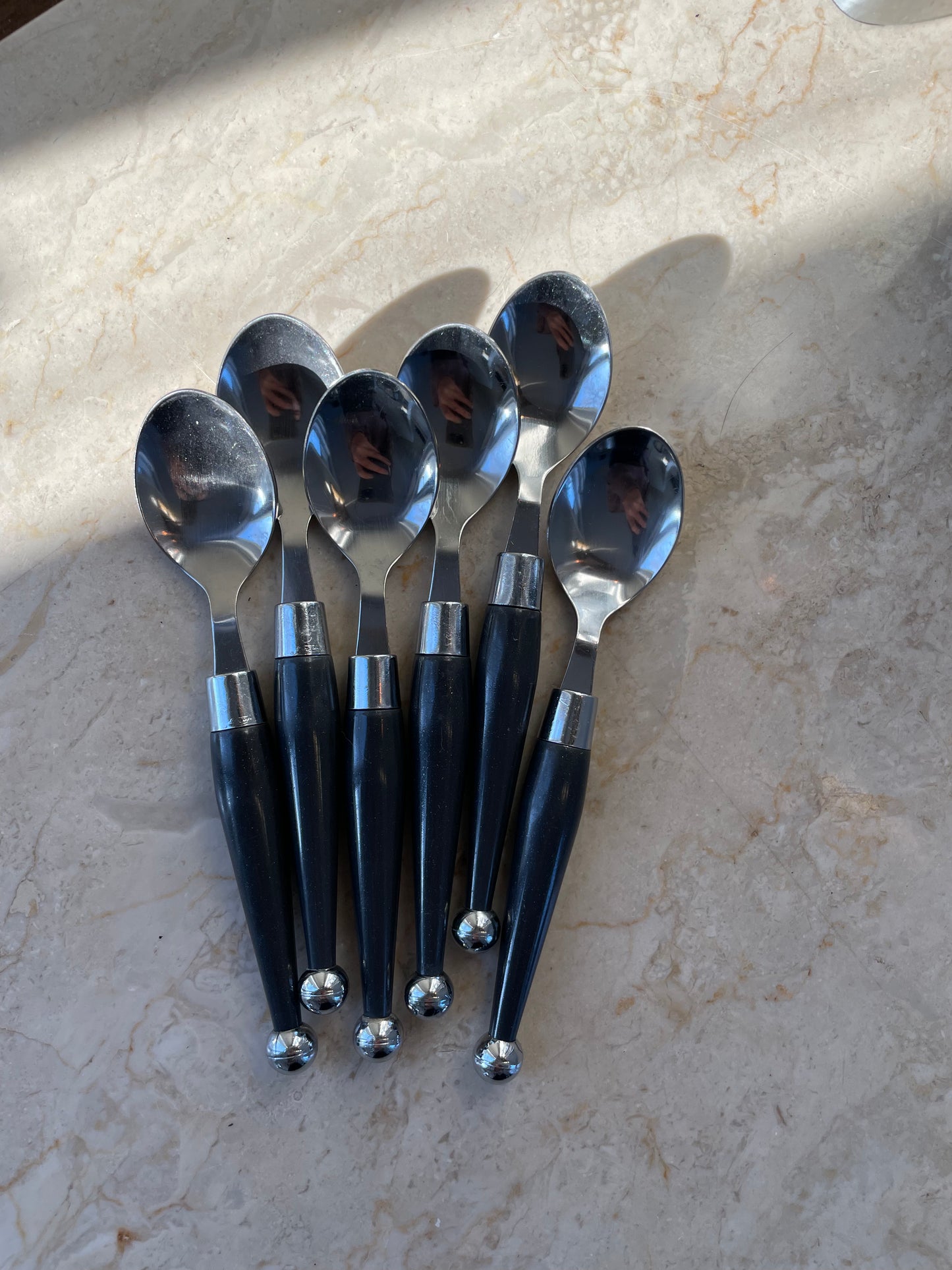 Six dessert spoons