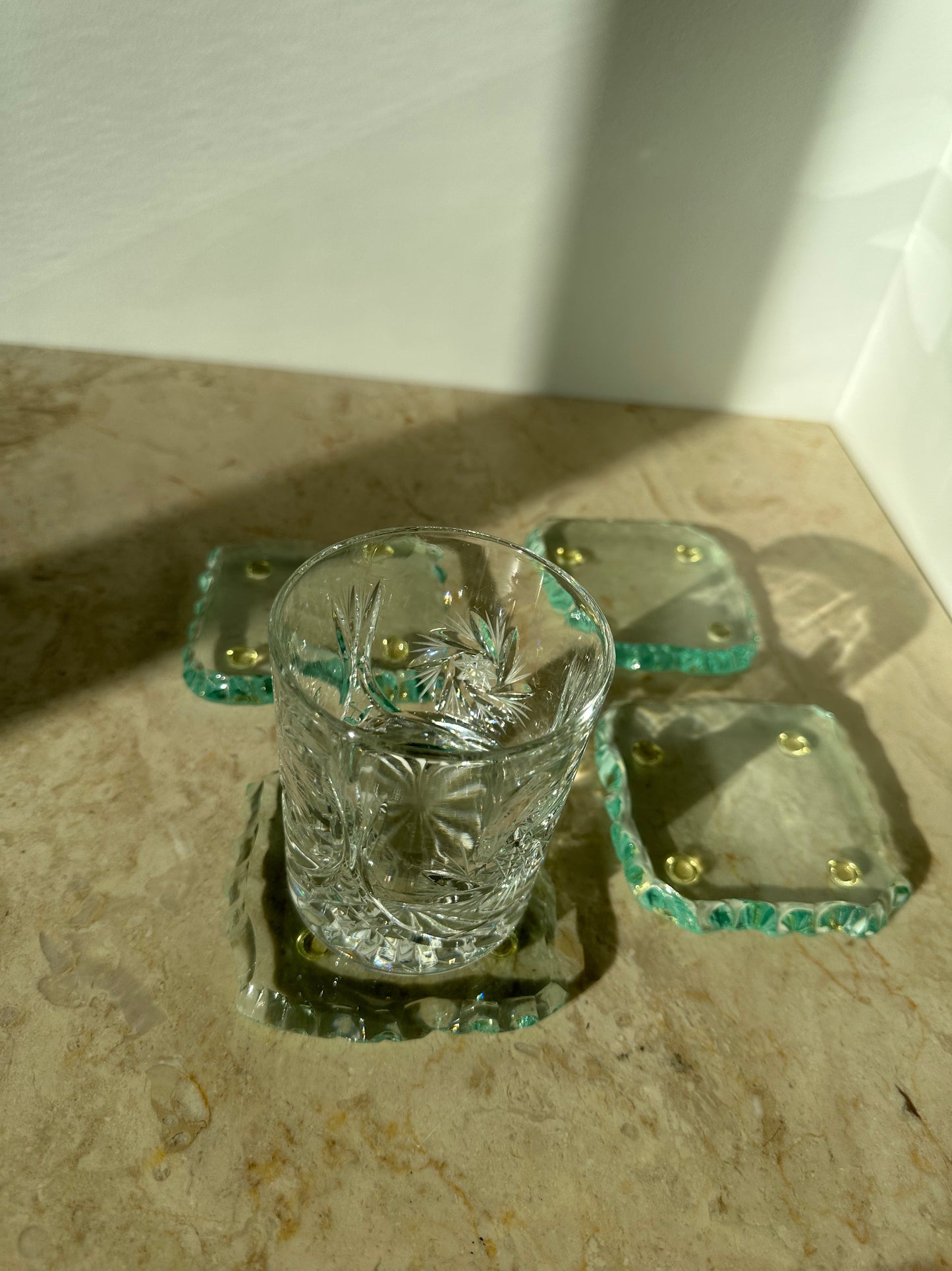 Four glass coasters